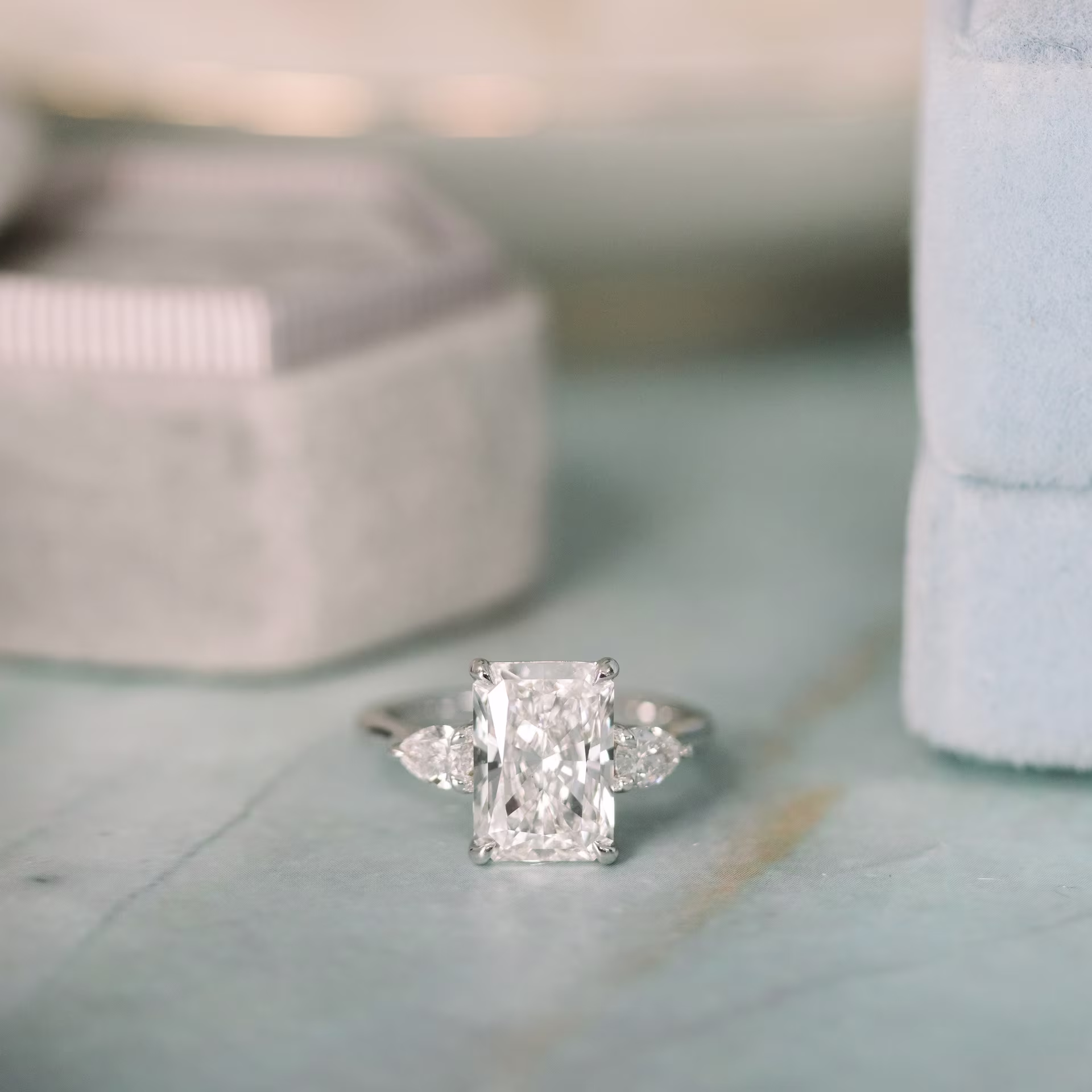 18k 2.5 ct white gold radiant cut and pear three stone man made diamond engagement ring ada diamonds design ad 486 macro