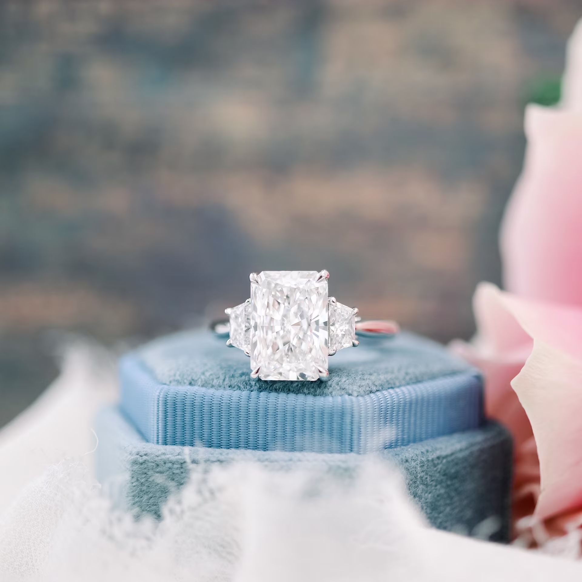 4ct radiant cut lab diamond engagement ring with trapezoid side stones in platinum