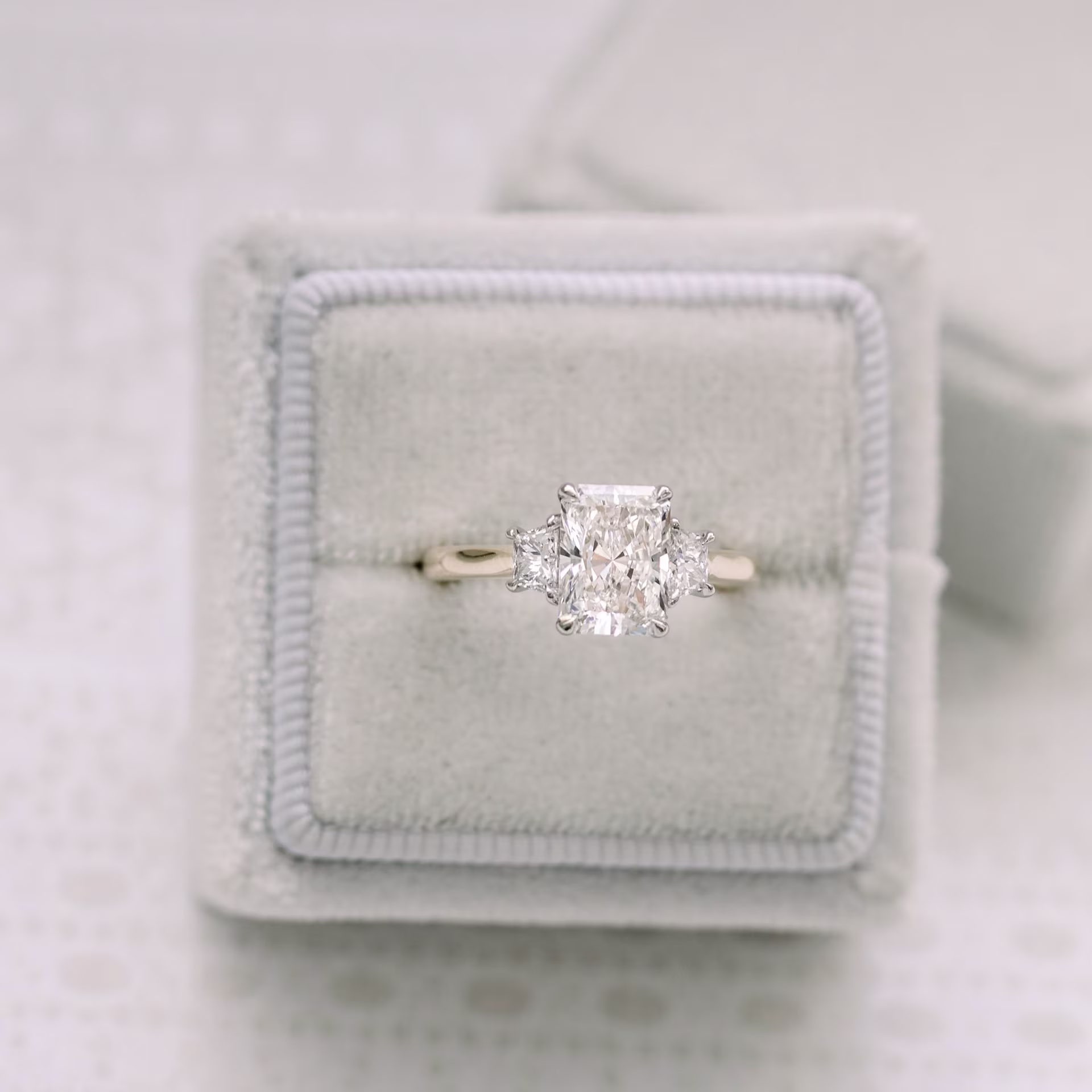 radiant two tone lab diamond three stone ring