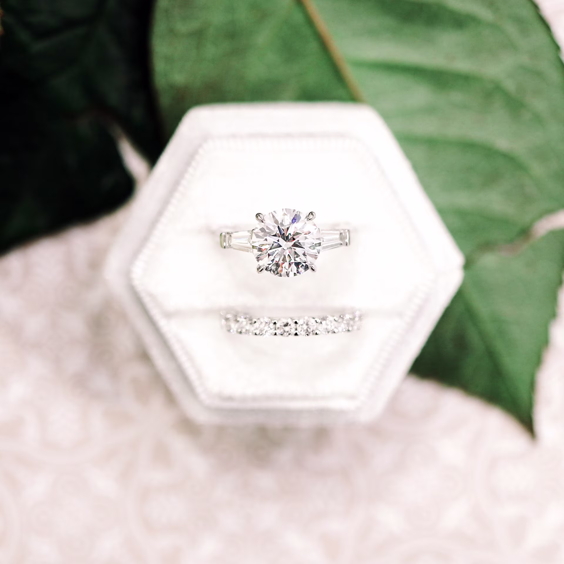 Platinum 3 Carat Round and Tapered Baguette Lab Diamond Engagement Ring with Lab Diamond Eternity Band Ada Diamonds Design AD-071 Artistic Image in White Box