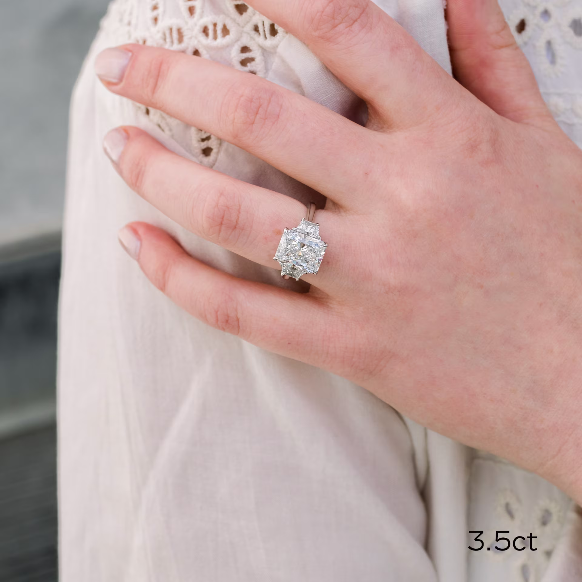 platinum 3.5ct radiant cut lab diamond engagement ring with trapezoid side stones ada diamonds design ad 278 on model