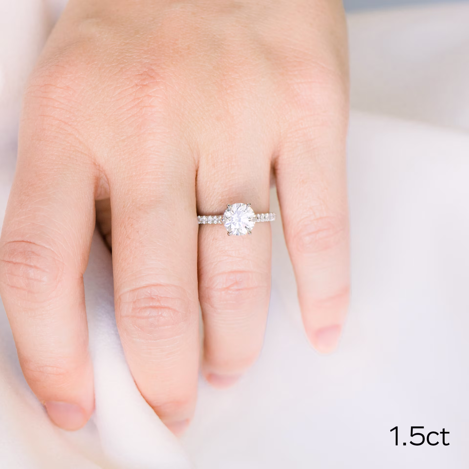 Exceptional Quality 1.5 Carat Man Made Diamonds set in Platinum Round Trellis Six Prong Pavé Diamond Engagement Ring (Main View)