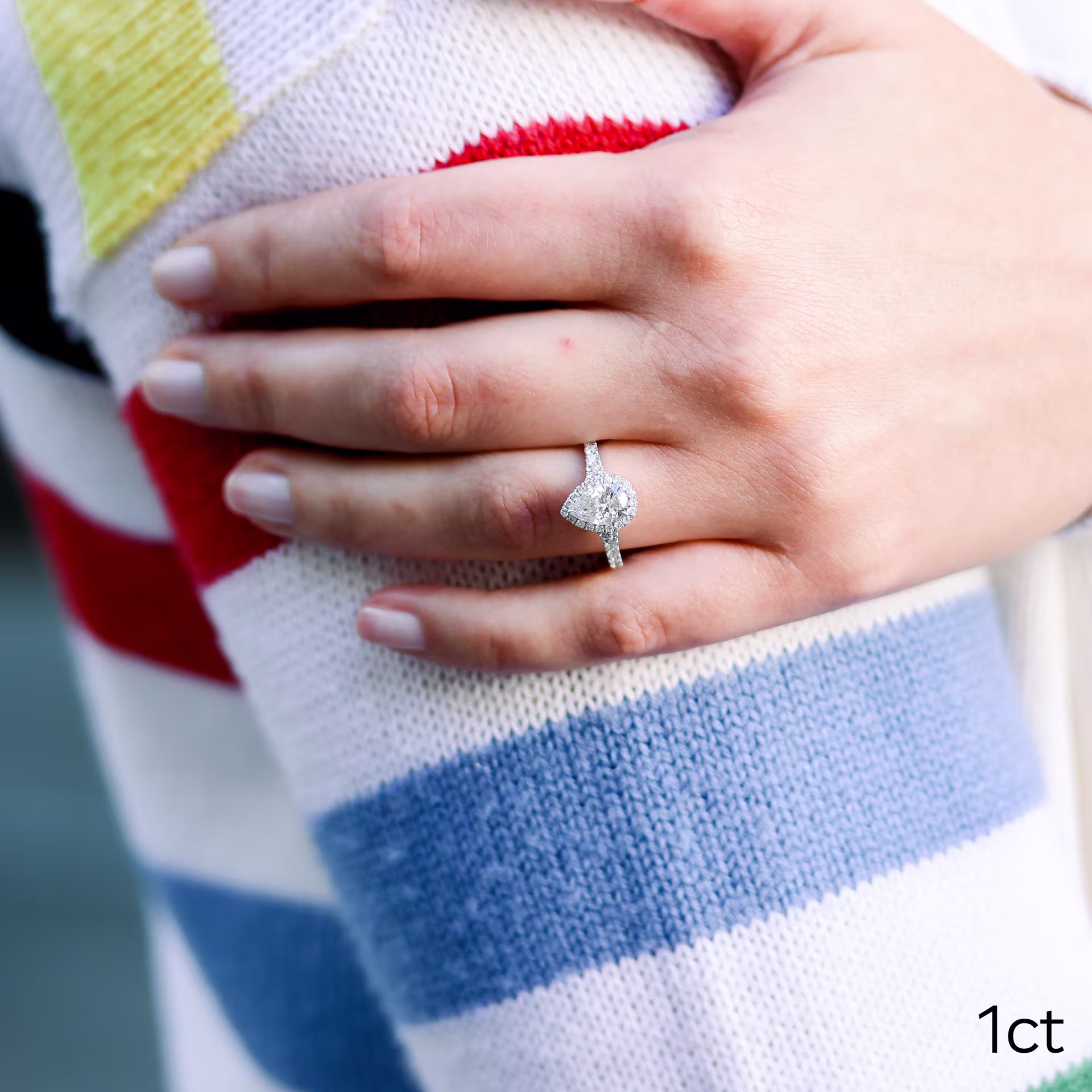 18k white gold halo split shank setting with 1 carat pear lab diamond ada diamonds design ad-161 on model