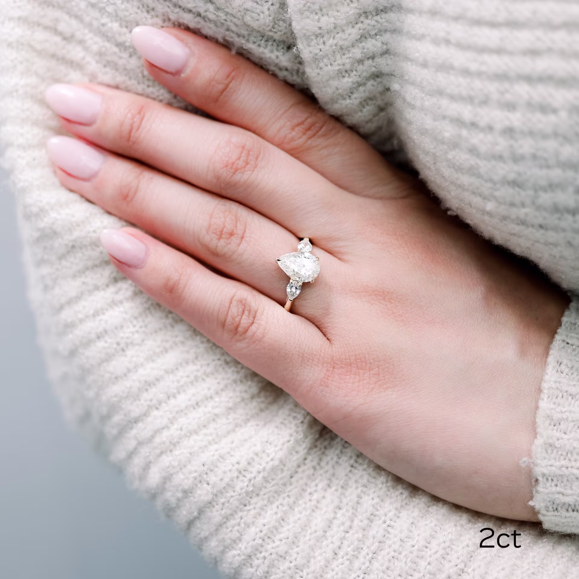 18k yellow gold 2 carat pear three stone lab diamond engagement ring ada diamonds design ad 218 on model