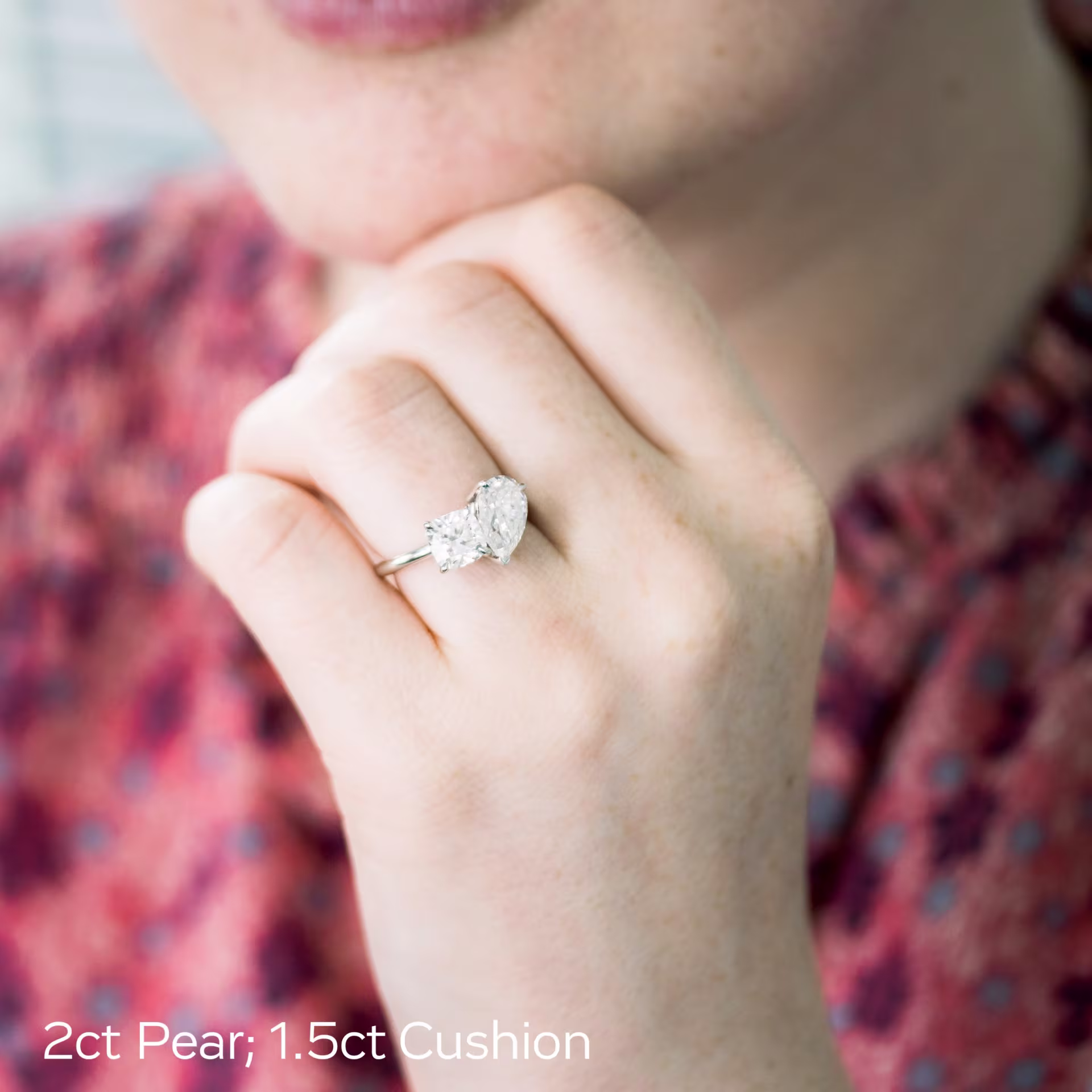 cushion and pear engagement ring white gold on model with lab diamonds