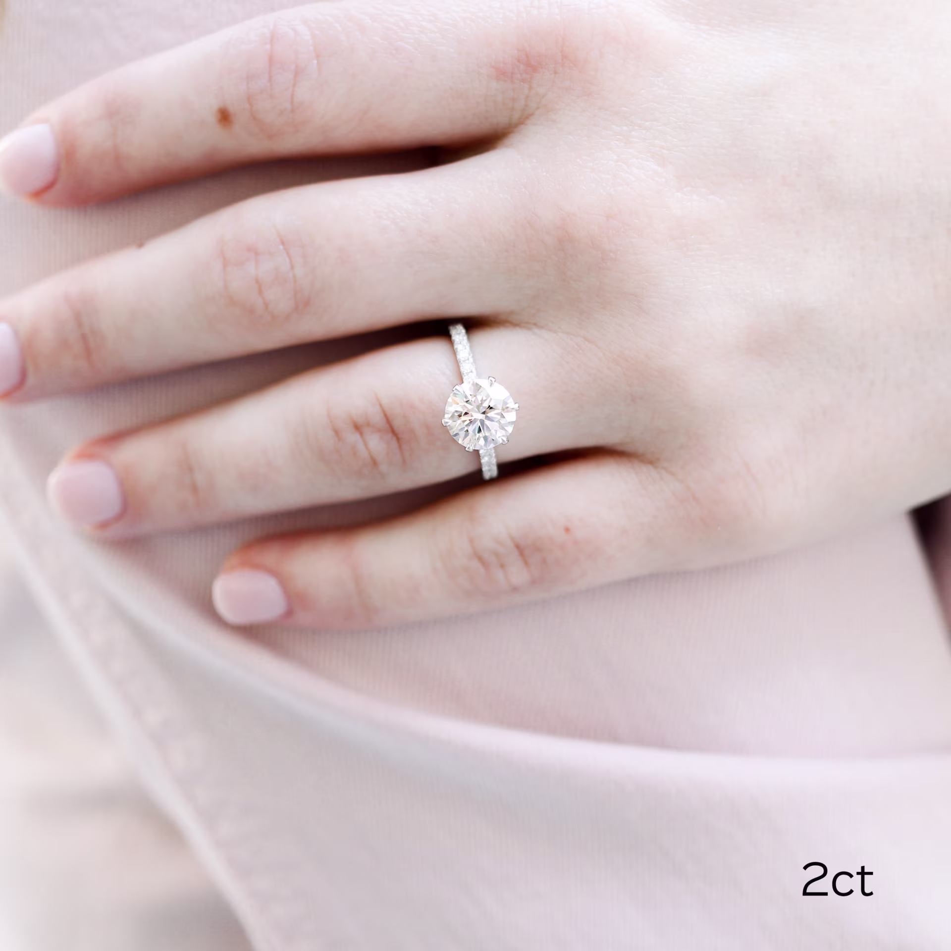 Platinum 2 Carat Round Six Prong Pavé Lab Diamond Ring Ada Diamonds Design AD-243 on Hand