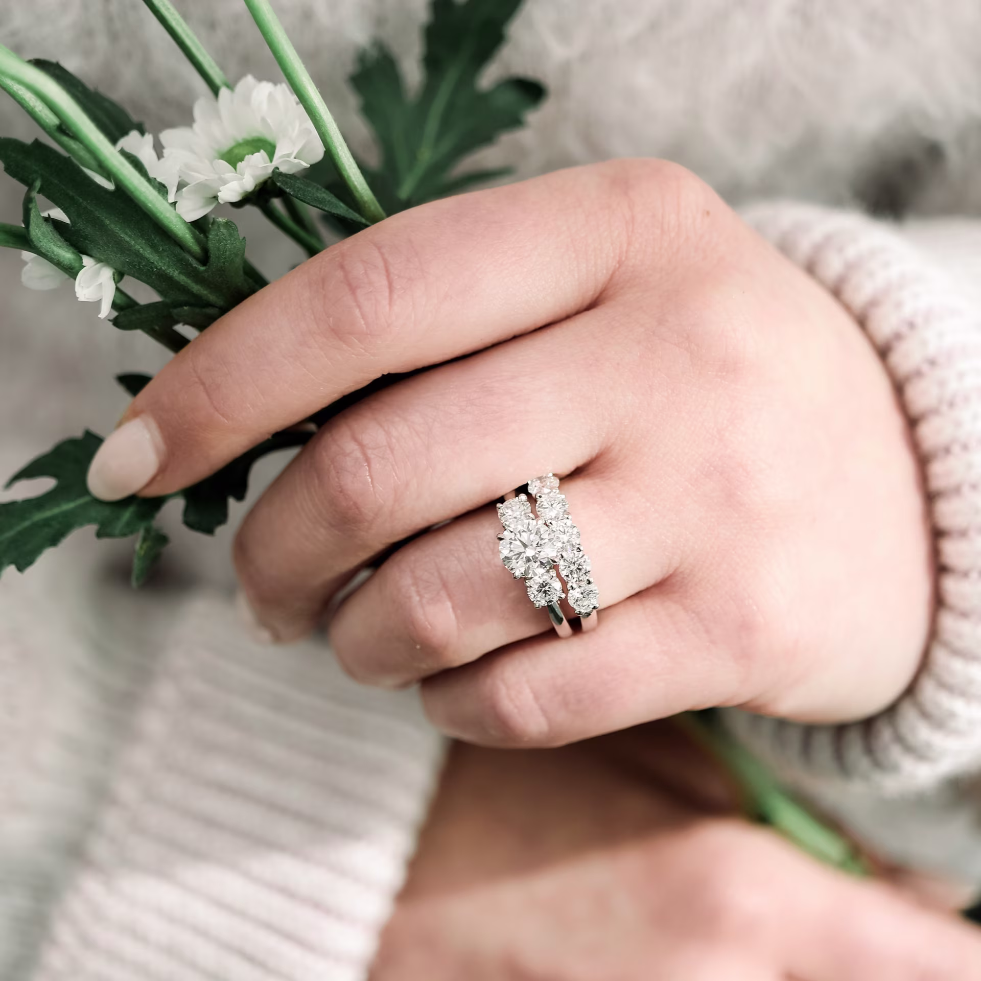 Diamonds set in Platinum Round Three Stone Setting