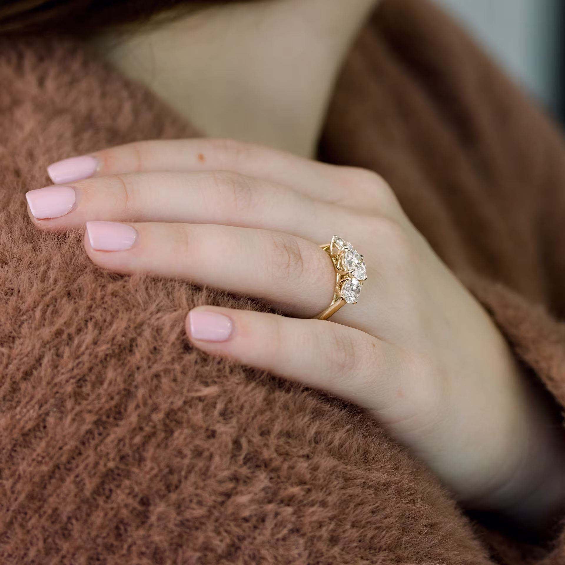 trellis basket on three stone engagement ring