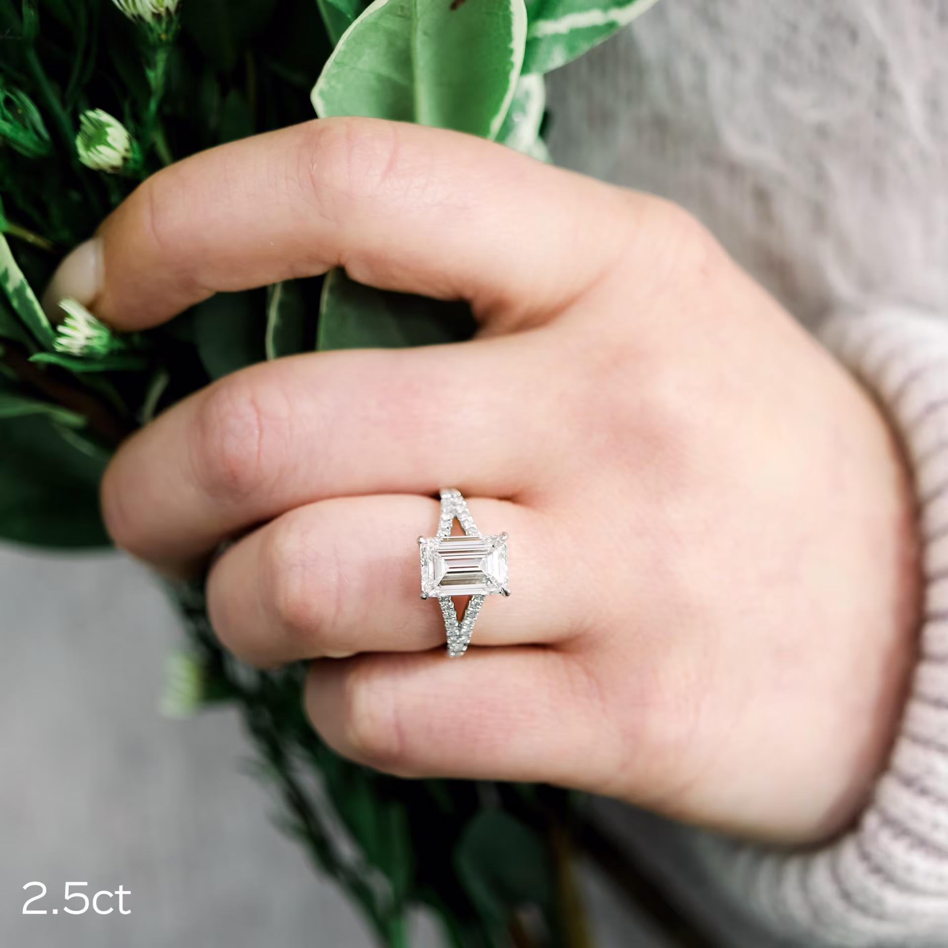 2.5ct emerald cut lab diamond in split shank pave