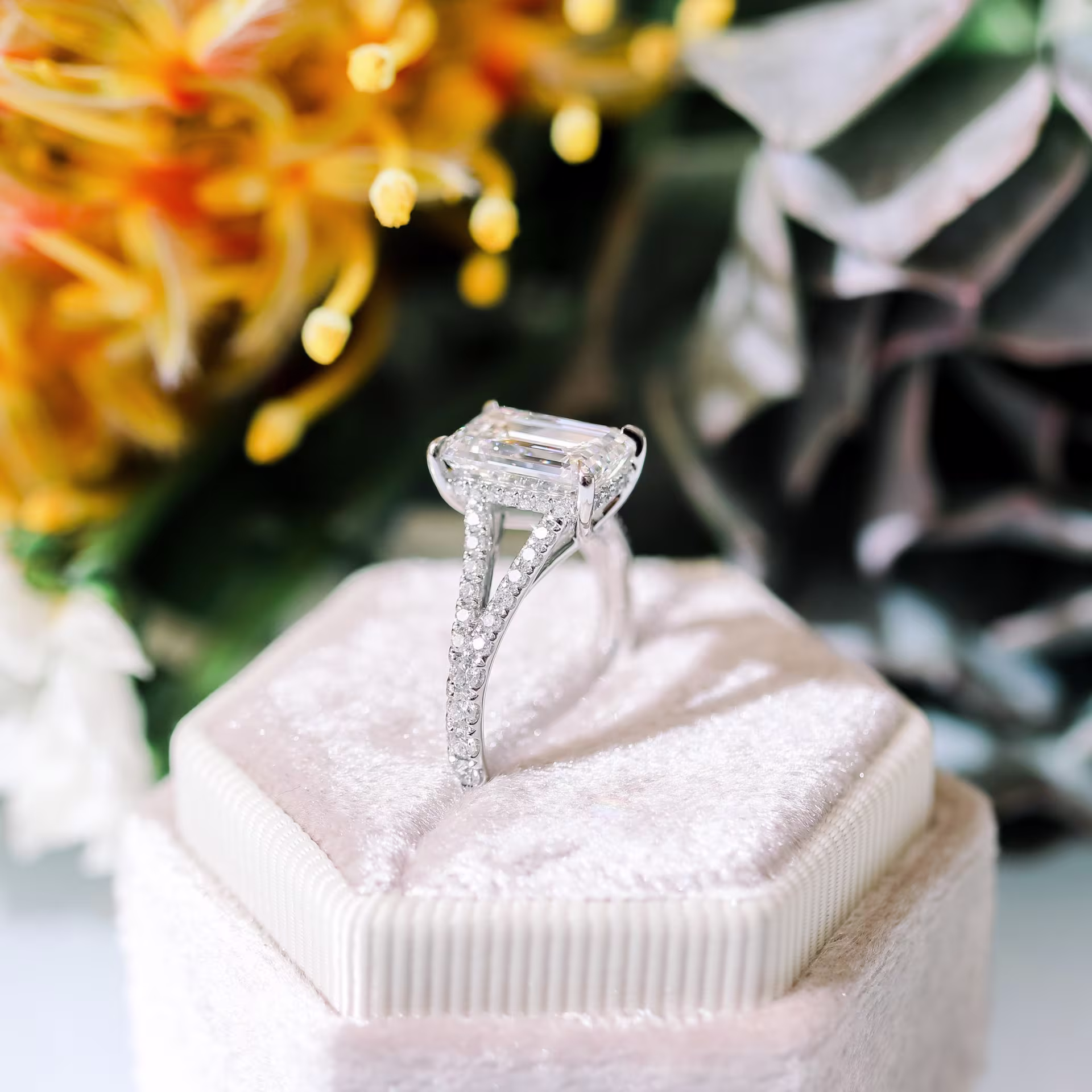 platinum pave engagement ring with emerald cut