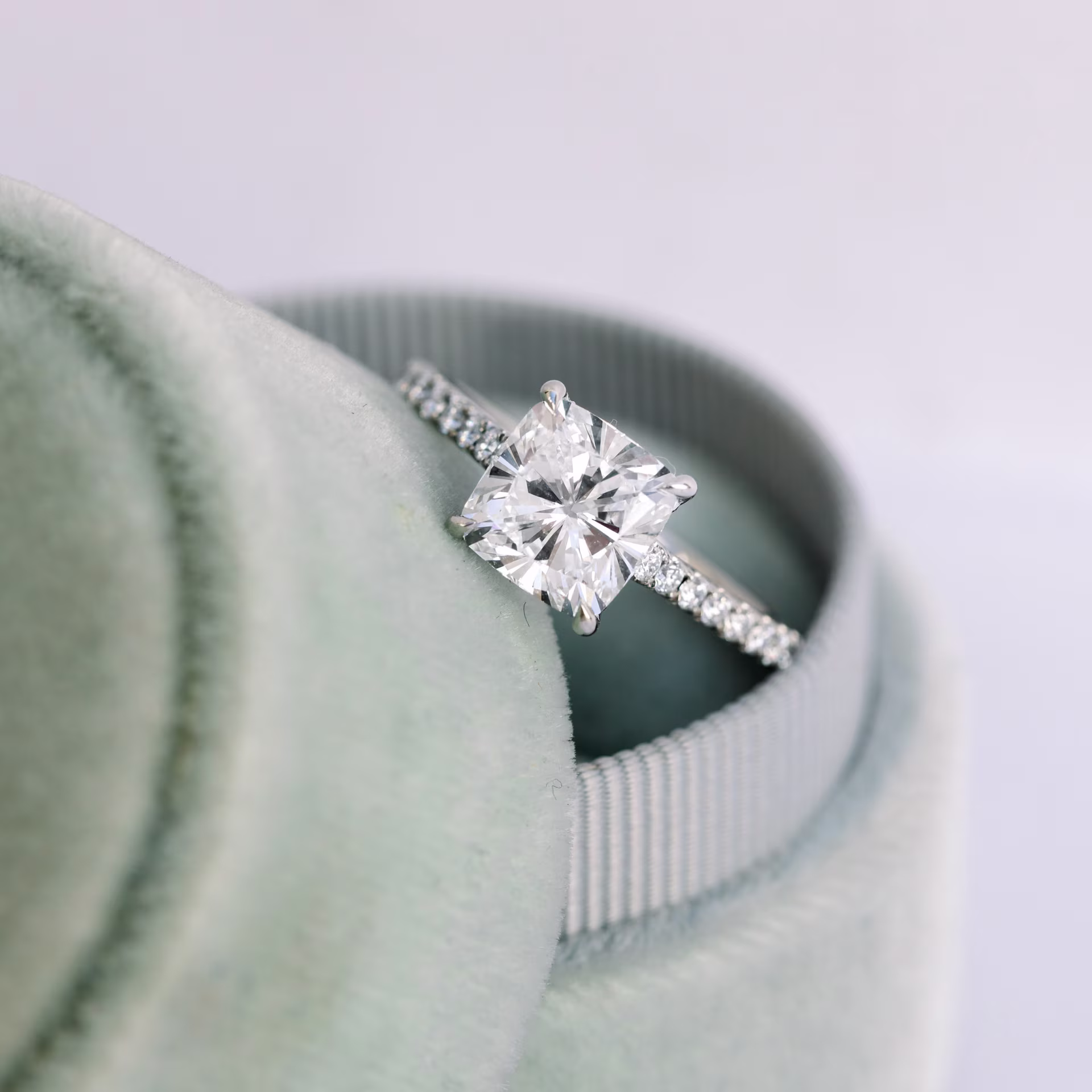 Platinum Cushion Cathedral Pavé Setting featuring 2.75 ctw Man Made Diamonds