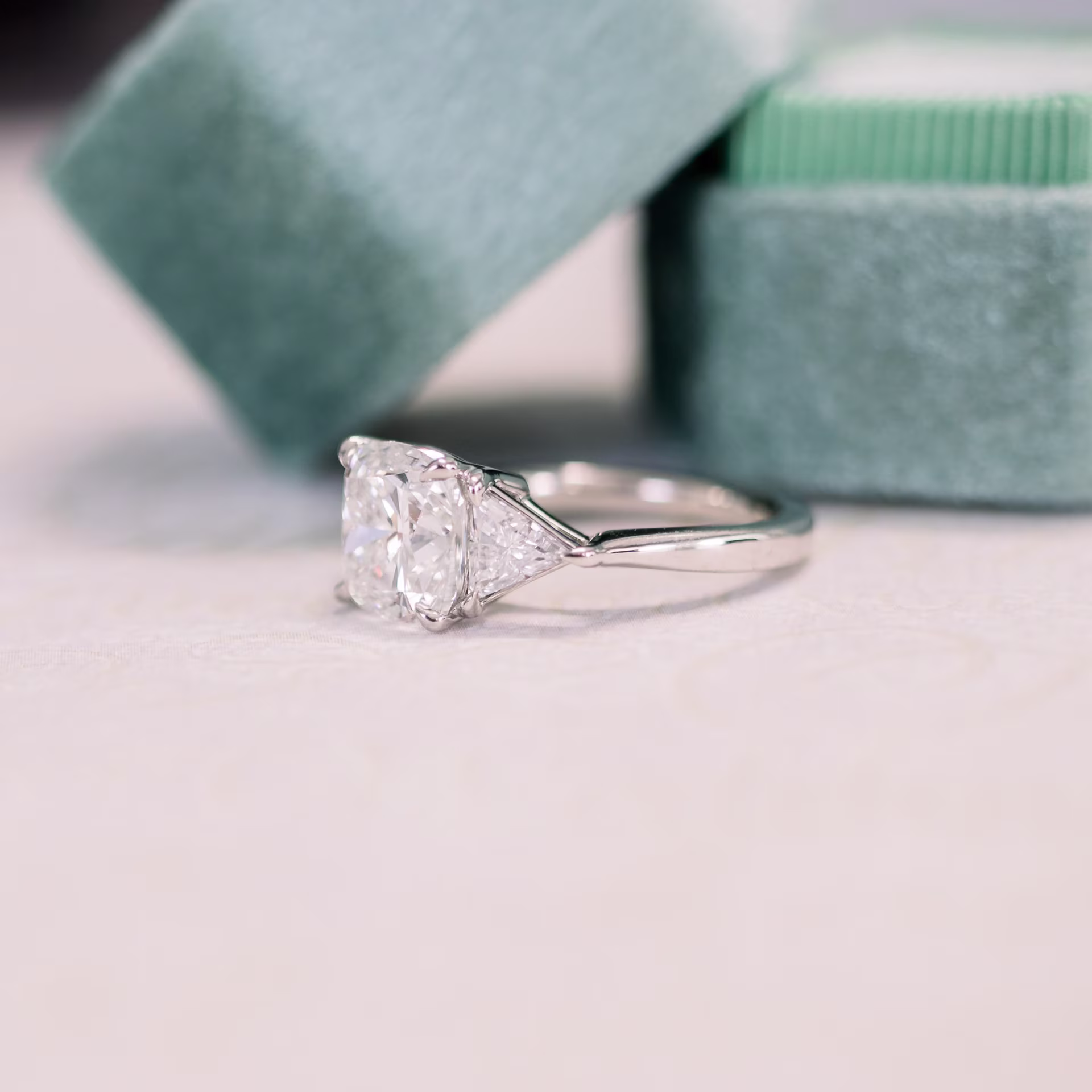 Cushion and Trillion Setting featuring Hand Selected Diamonds