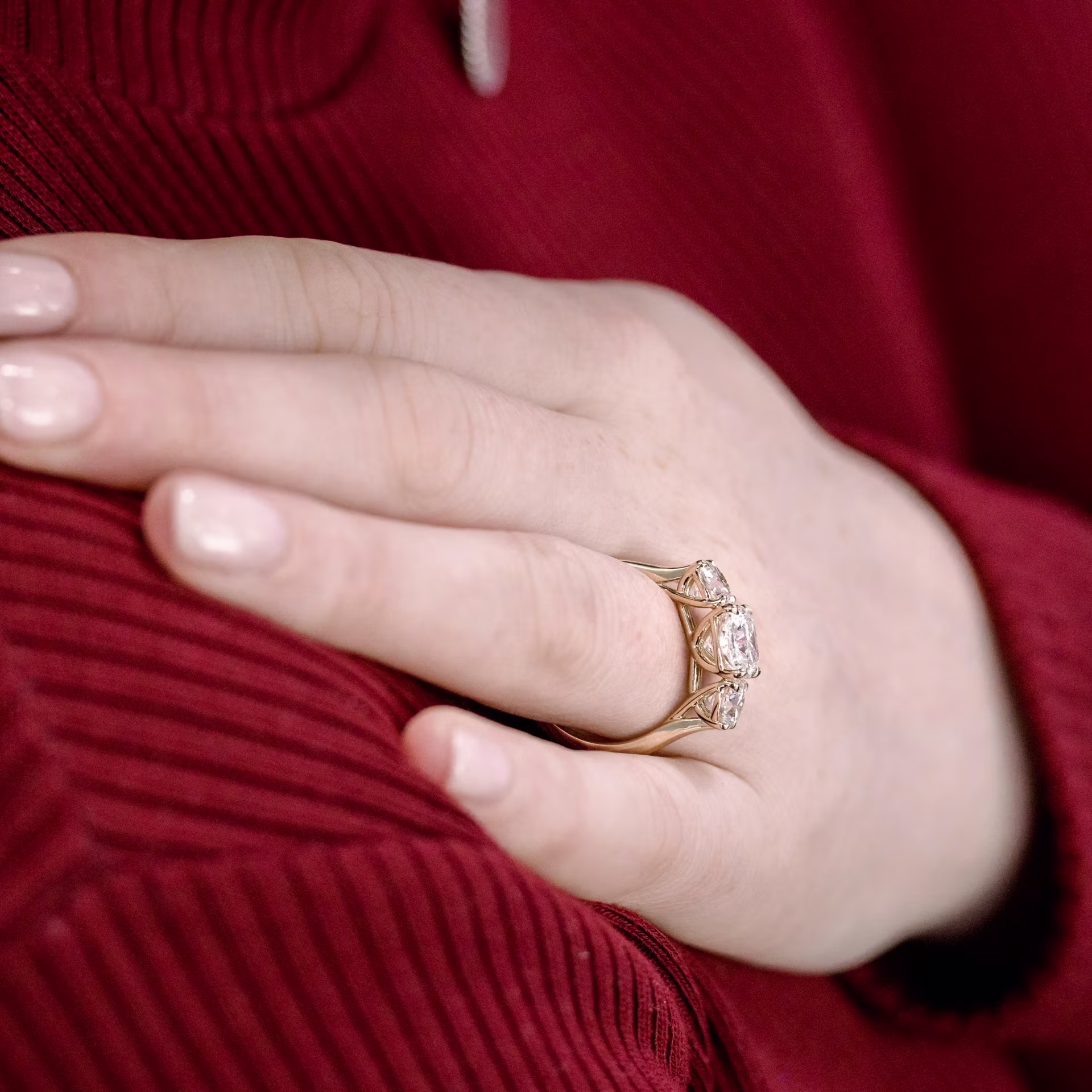 lab created three stone engagement ring