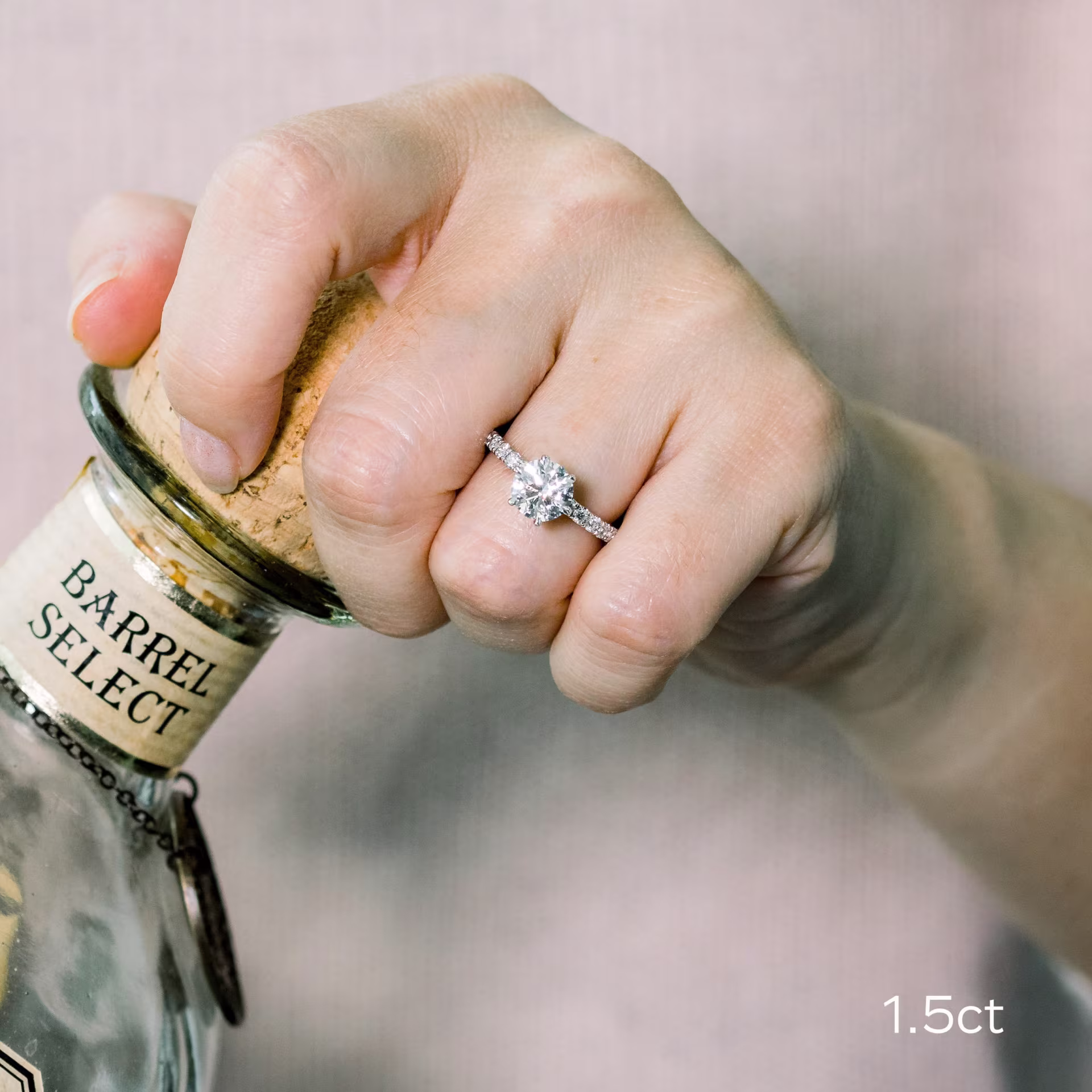 1.5ct round lab diamond in diamond collar setting