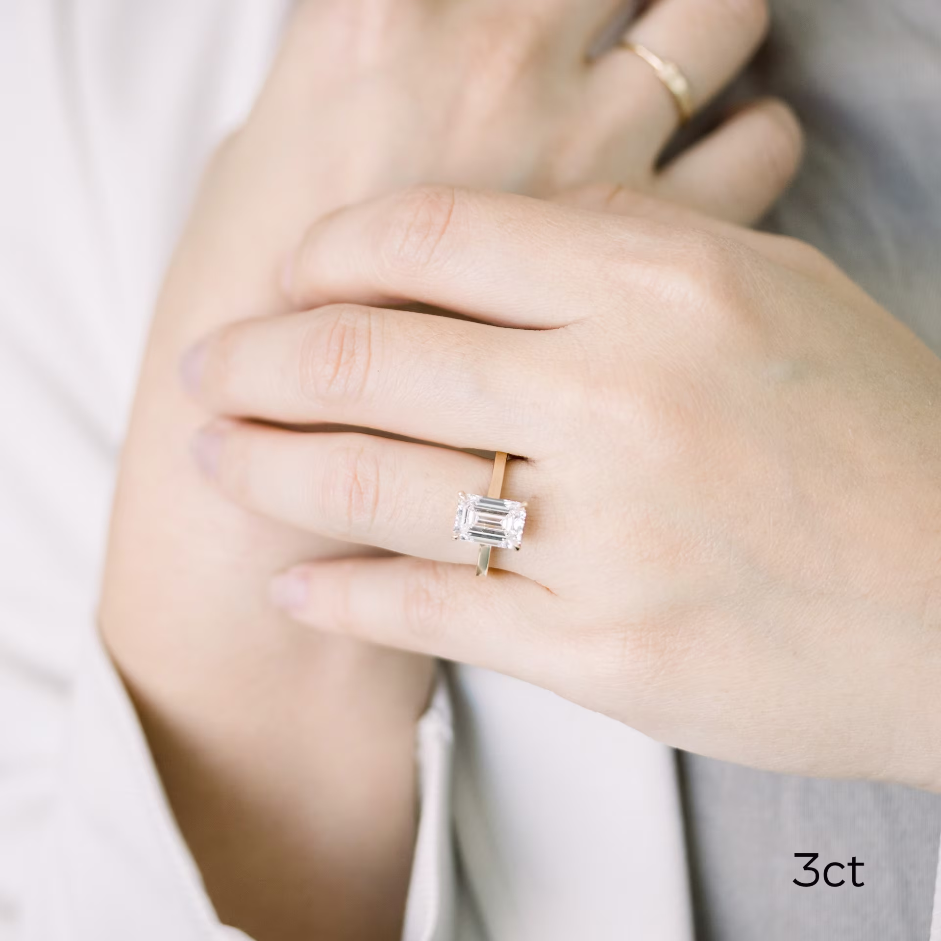 14k yellow gold 3 carat emerald cut lab created diamond solitaire engagement ring ada diamonds design 068 on model