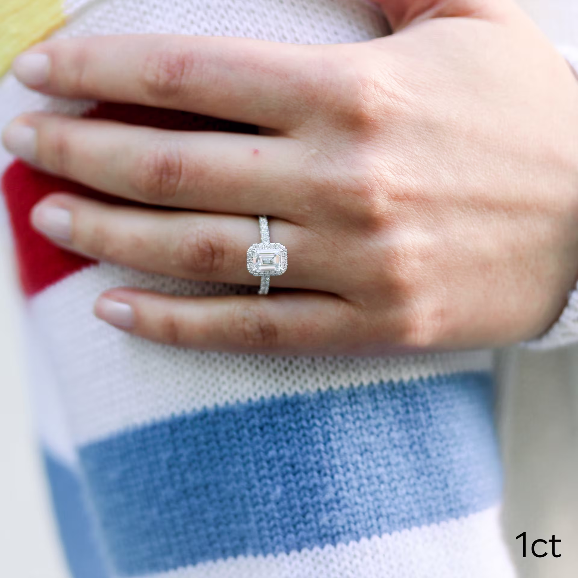 White Gold 1ct Emerald Cut Lab Diamond Ring with a Halo and Pavé Band Ada Diamonds Design AD-212 on Model