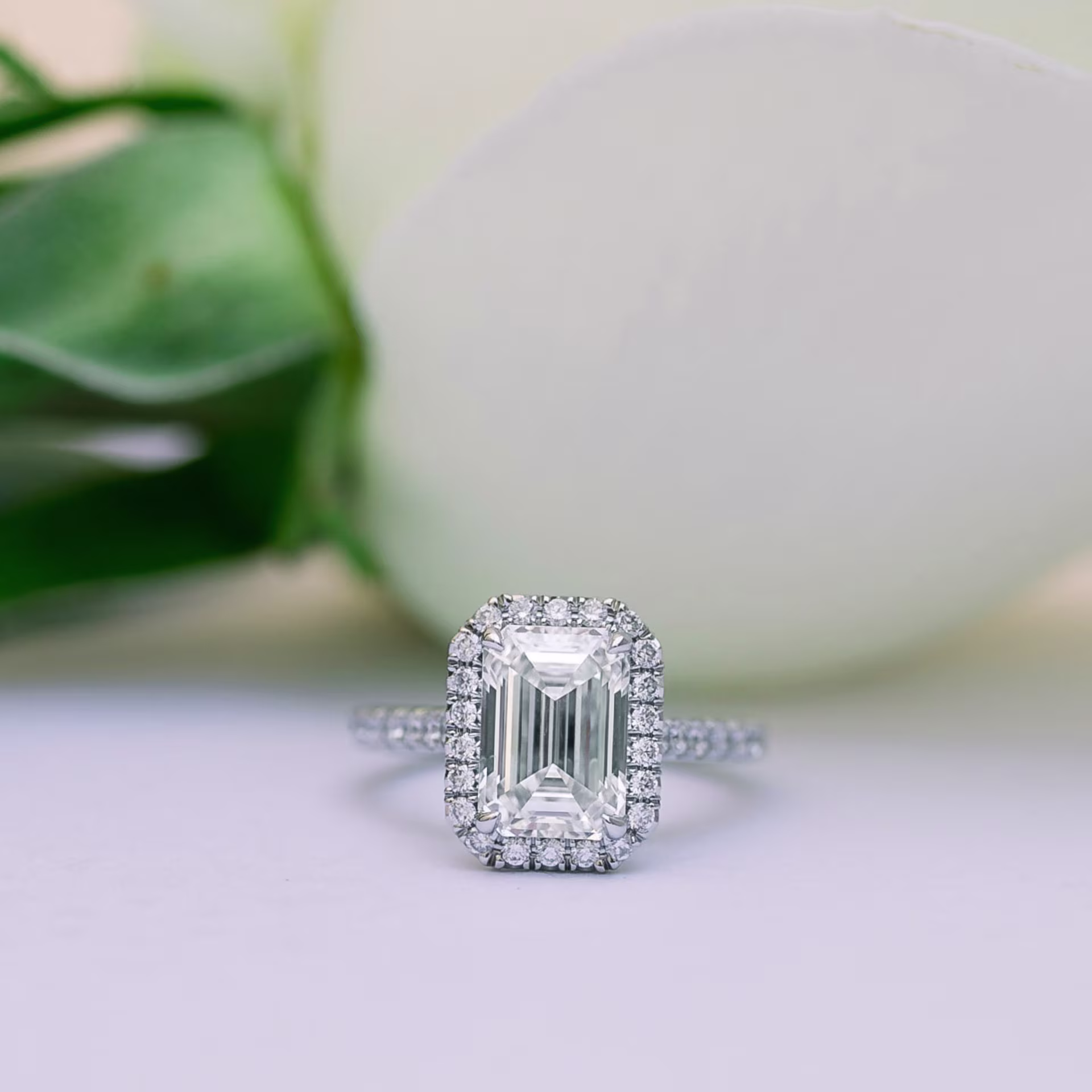 Platinum Emerald Halo Pavé Diamond Engagement Ring featuring 2.0 Carat Lab Grown Diamonds (Profile View)