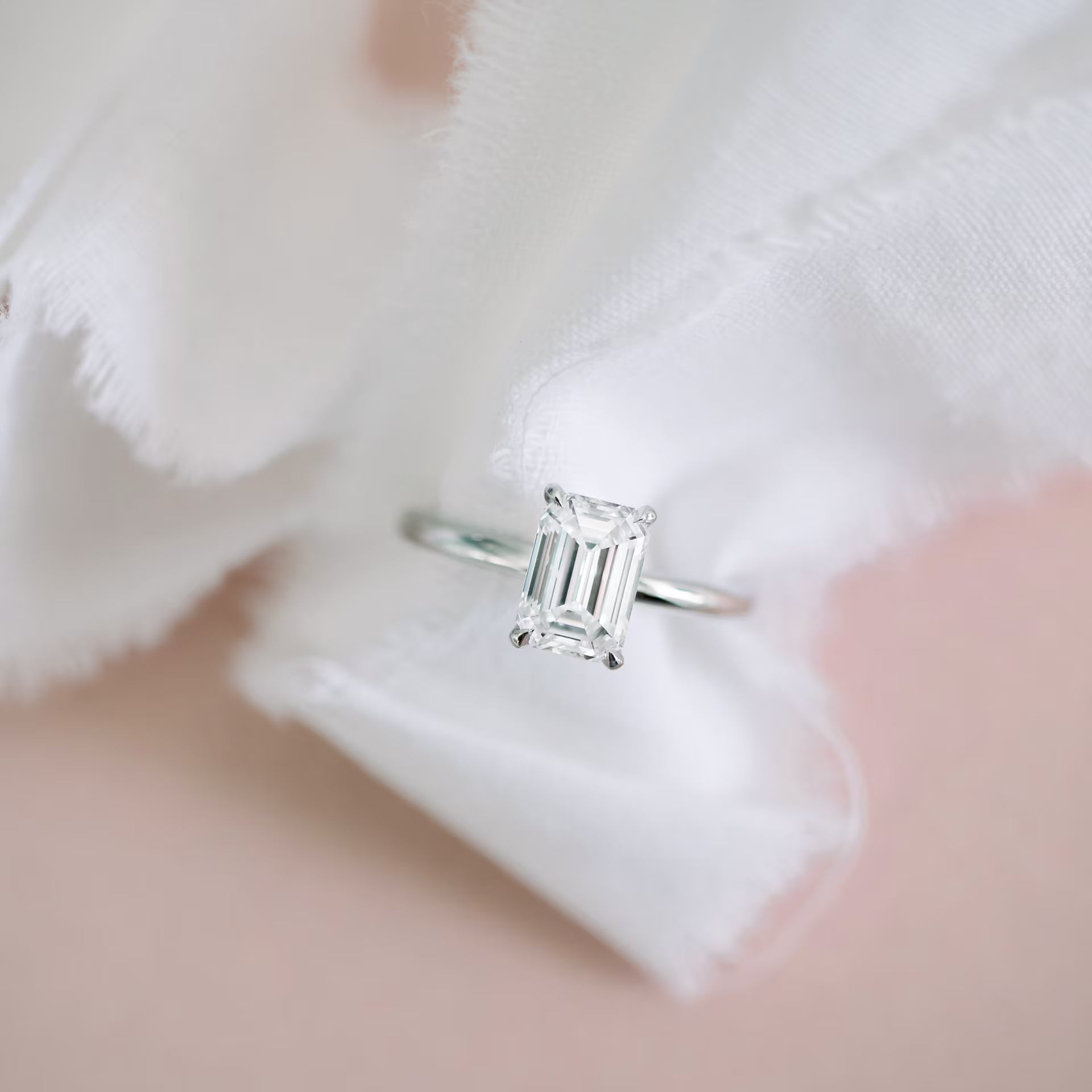 1.5ct emerald cut in solitaire