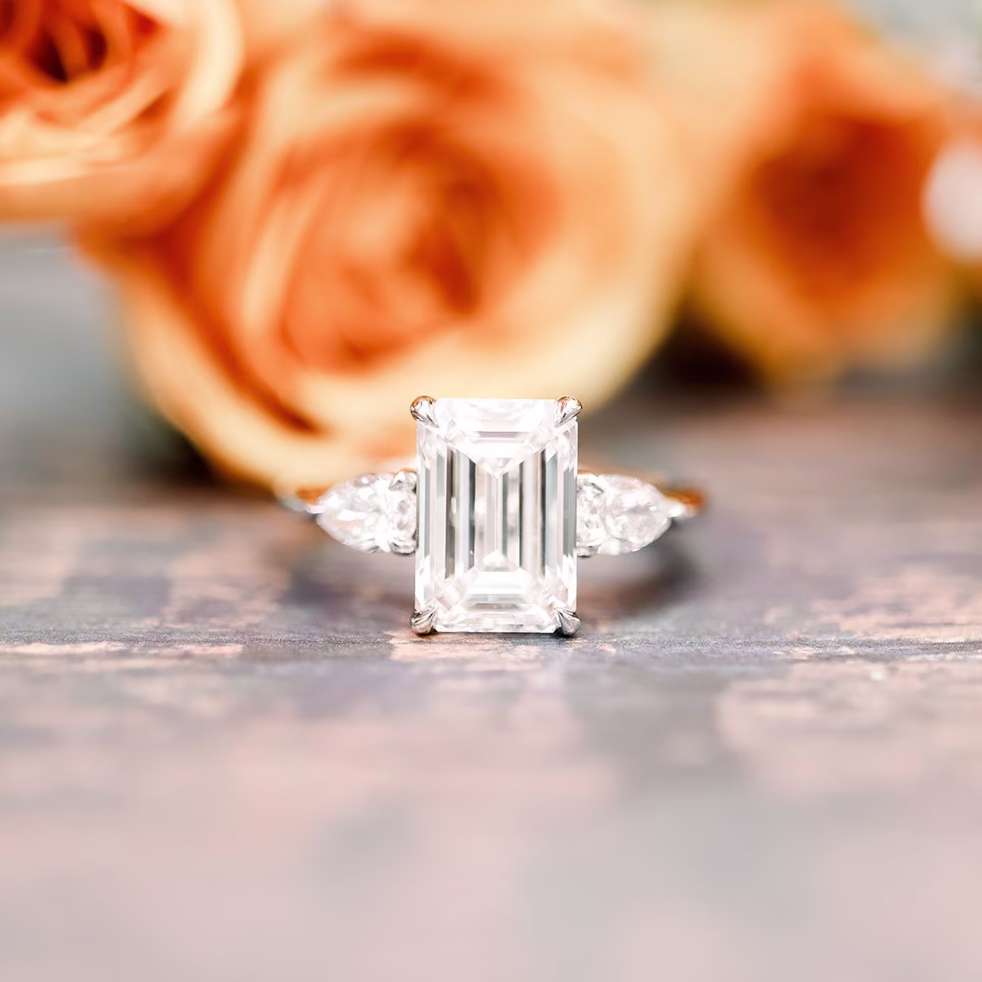 platinum 3.5ct emerald cut man made diamond engagement ring with pear side stones ada diamonds design ad 467