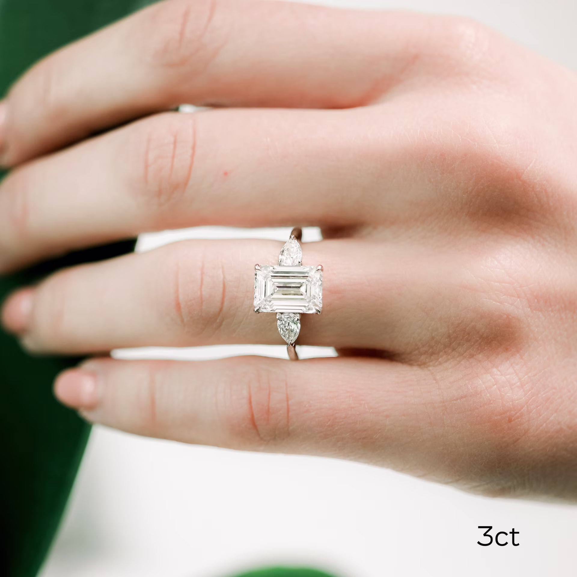platinum 3.5 carat emerald and pear lab created diamond engagement ring ada diamonds design ad 467 on model