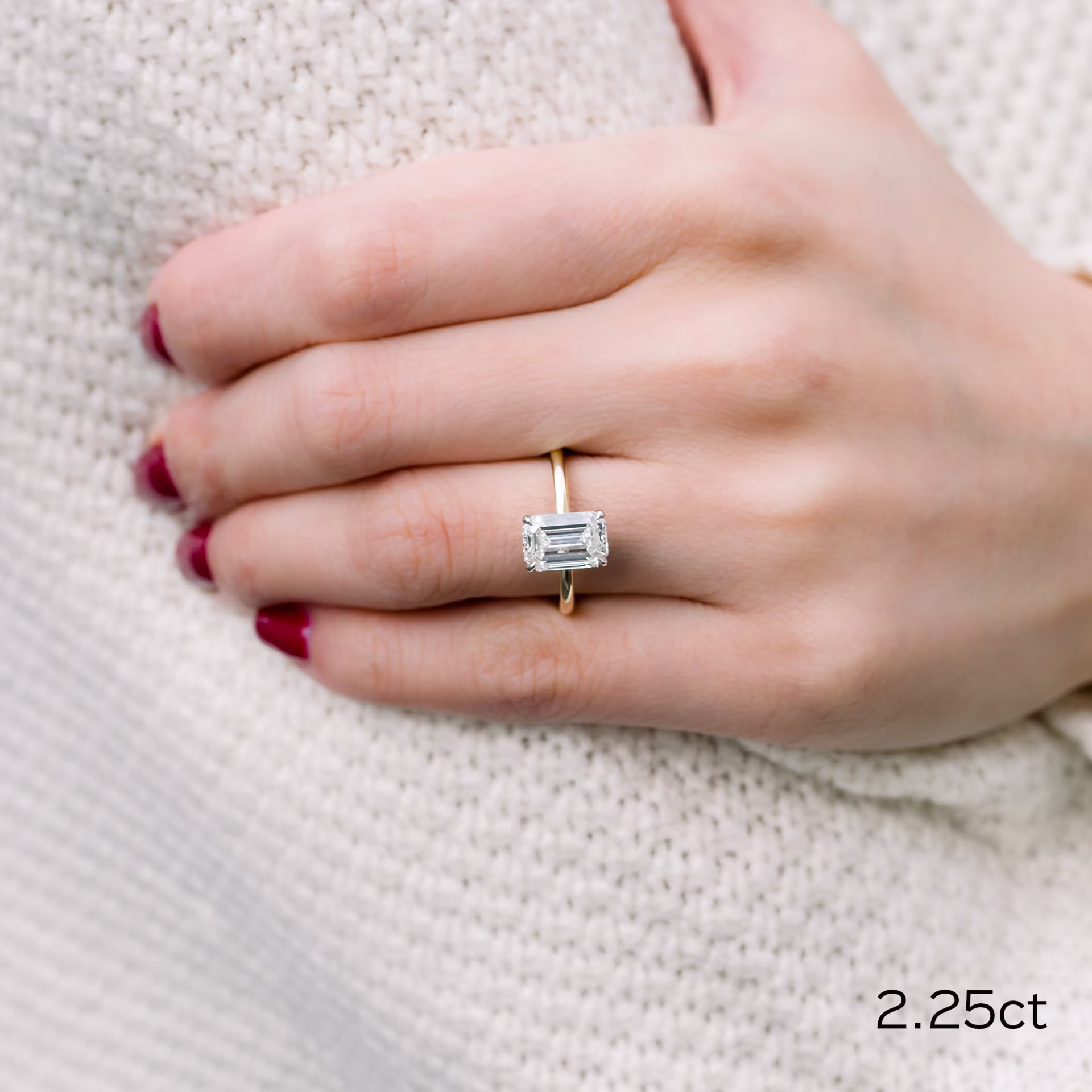 14k white and yellow gold 2.25ct emerald cut lab diamond solitaire engagement ring Ada Diamonds design ad-235 on model