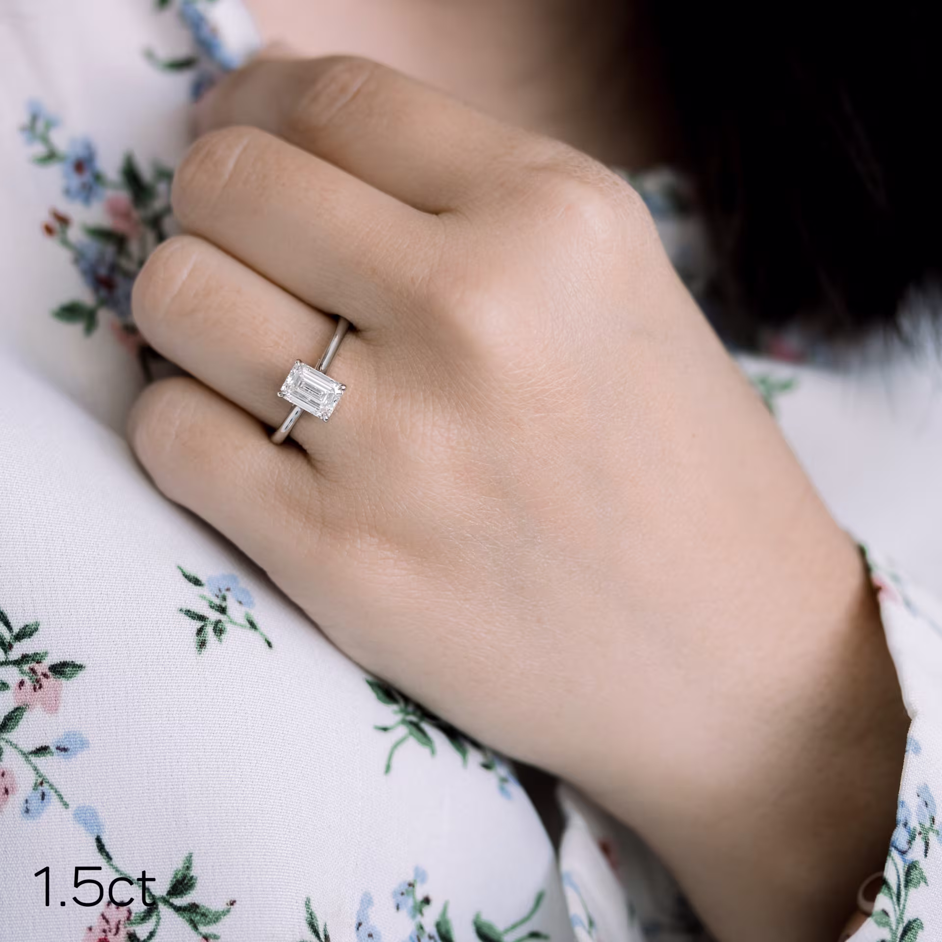 1.5ct emerald cut in trellis solitaire