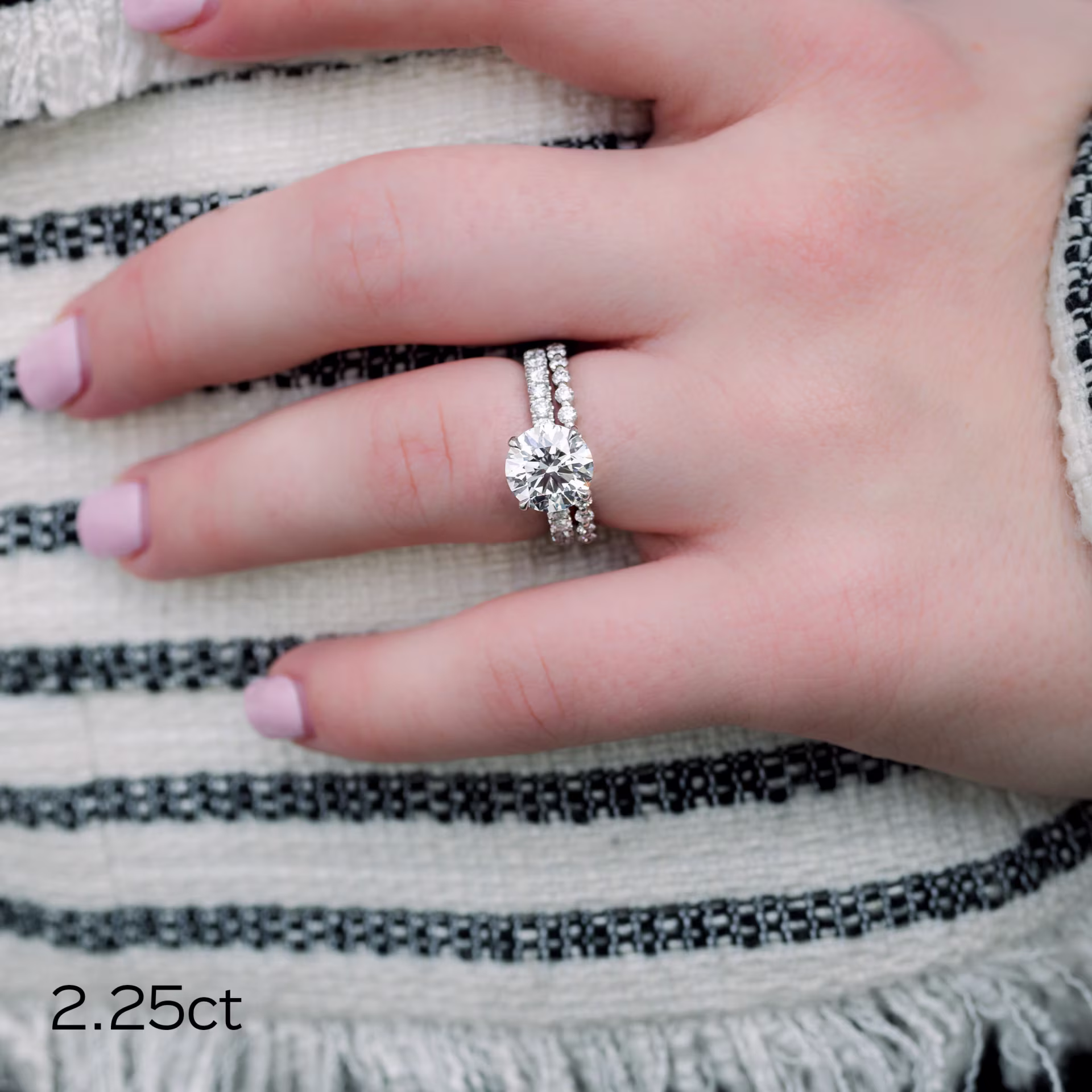 2.25ct round lab diamond in classic four prong pave setting in white gold