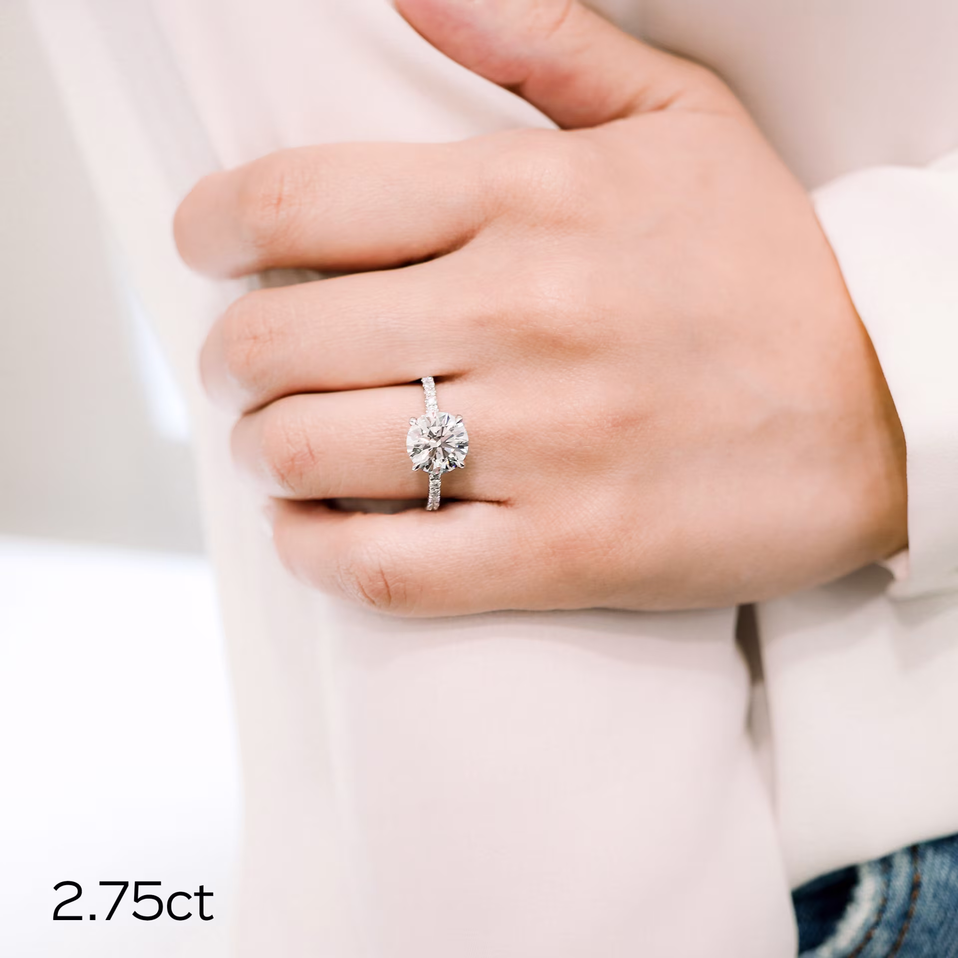 2.75ct round lab diamond in classic four prong pave setting in white gold