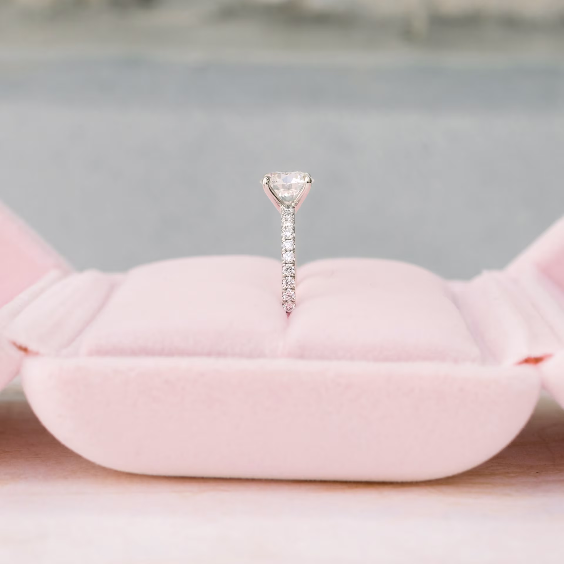 Platinum Round Classic Four Prong Pavé Diamond Engagement Ring featuring 1.75 ct Synthetic Diamonds (Side View)