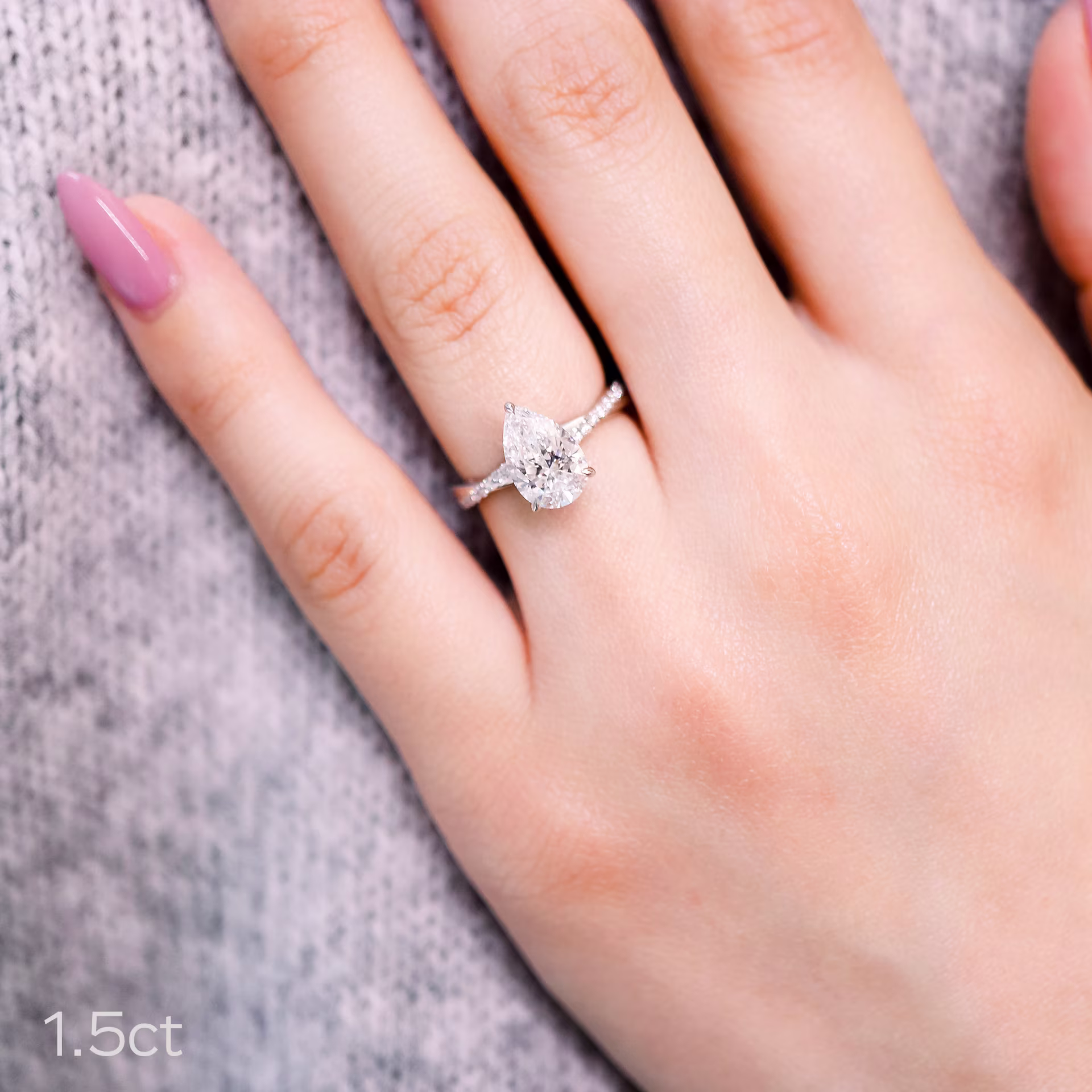 1.5ct pear lab diamond in twisting white gold setting