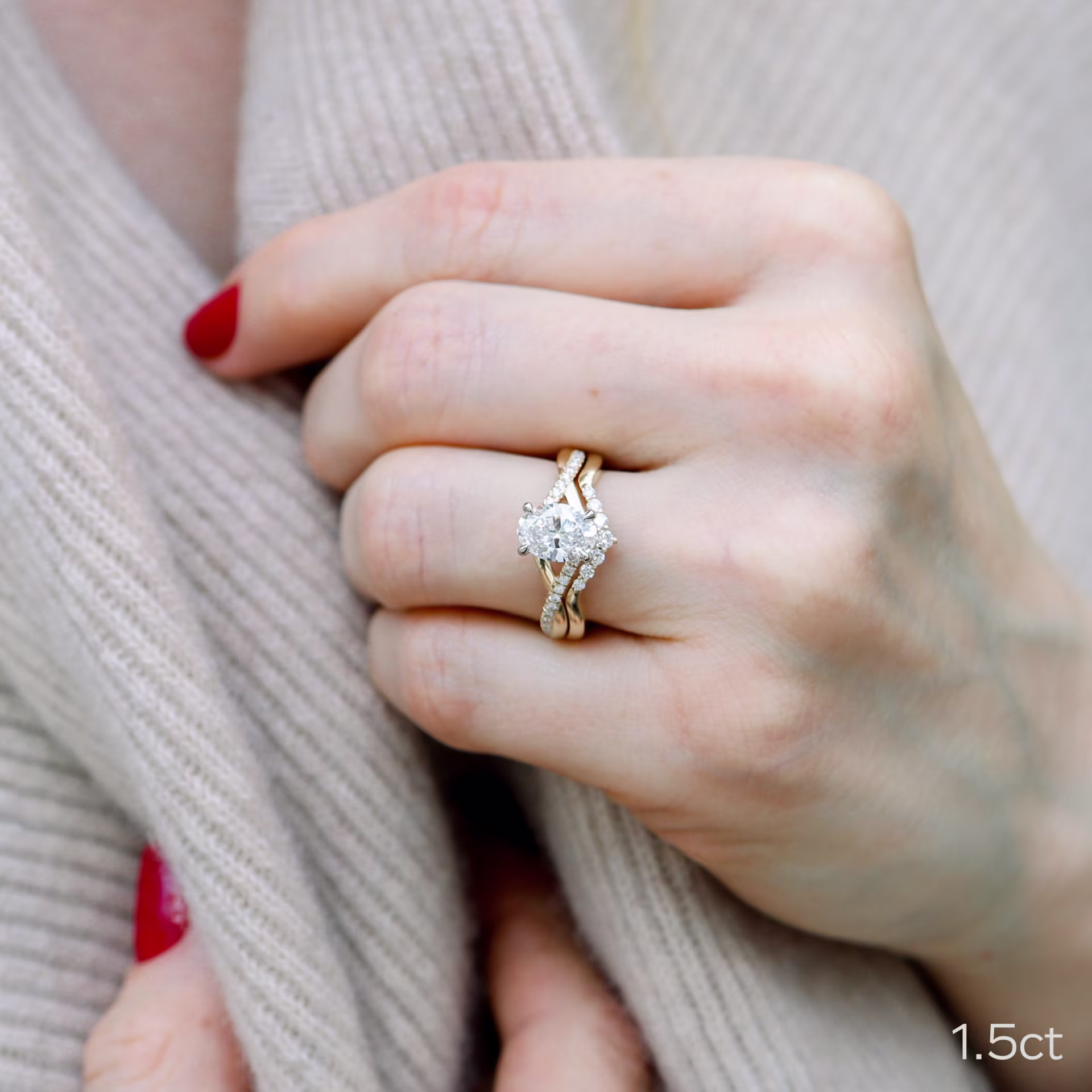 1.5ct oval lab diamond in two-tone twsting setting