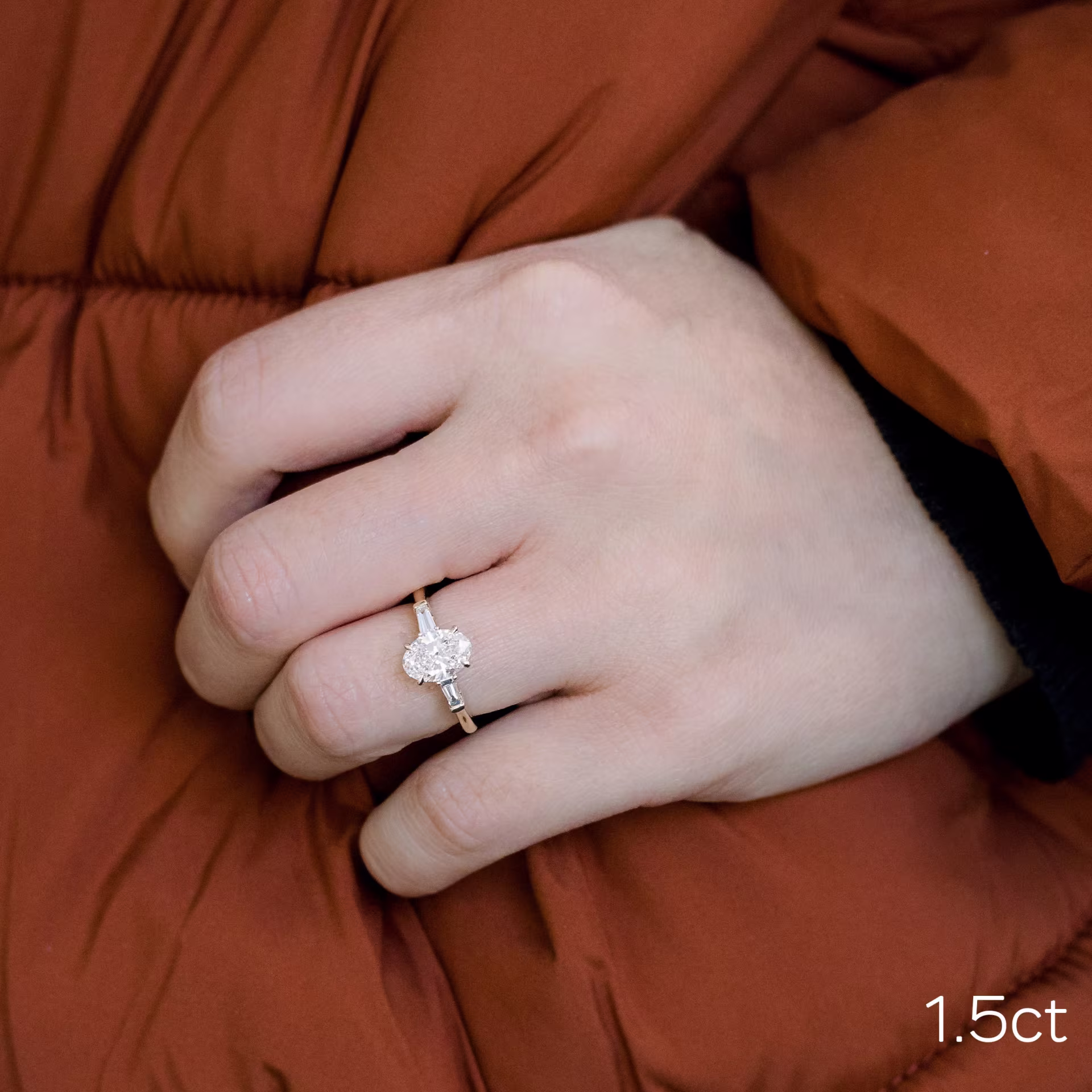 1.5ct oval in tapered baguette setting