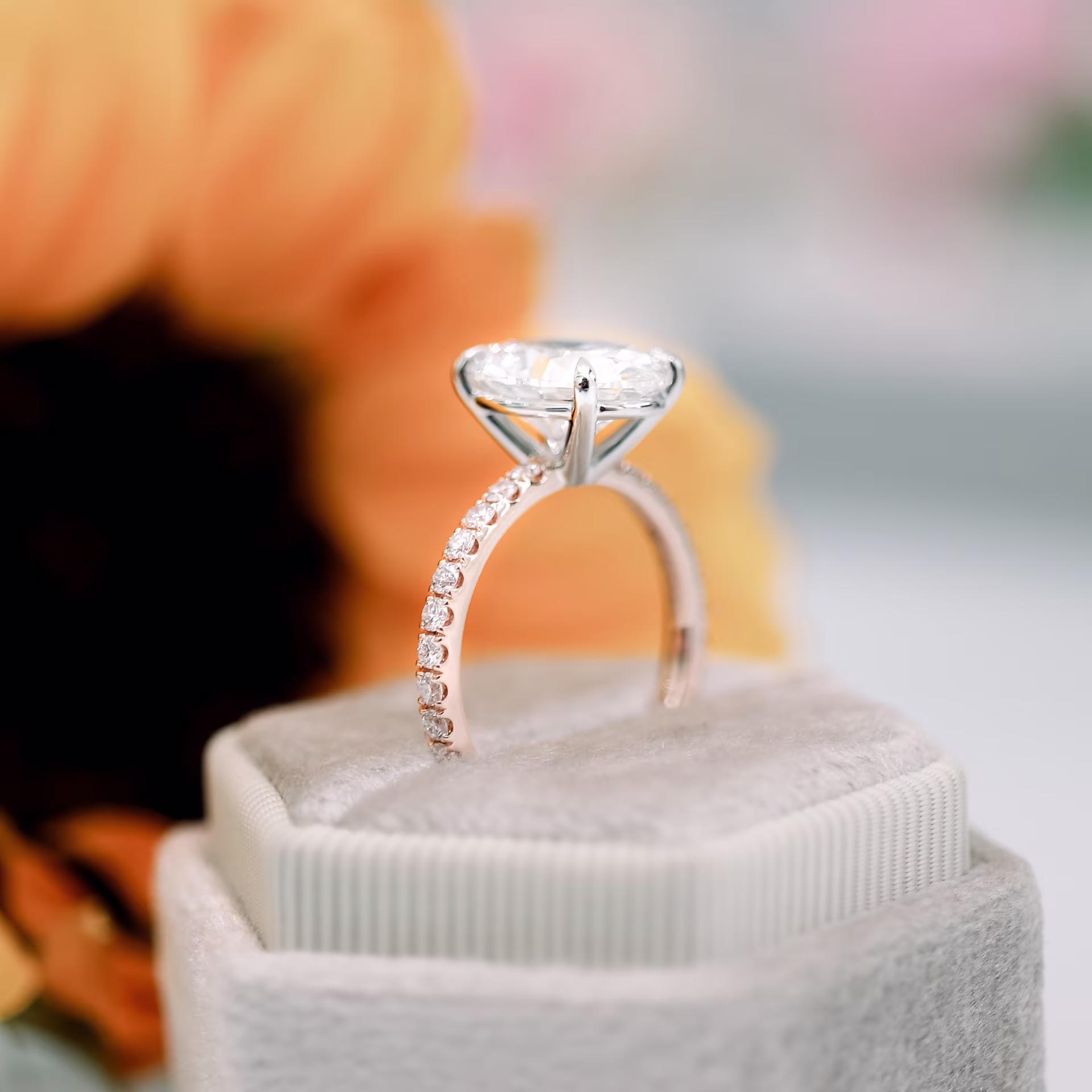 platinum and rose gold two tone 4 carat oval cut lab created diamond pavé engagement ring ada diamonds design ad 230 profile view