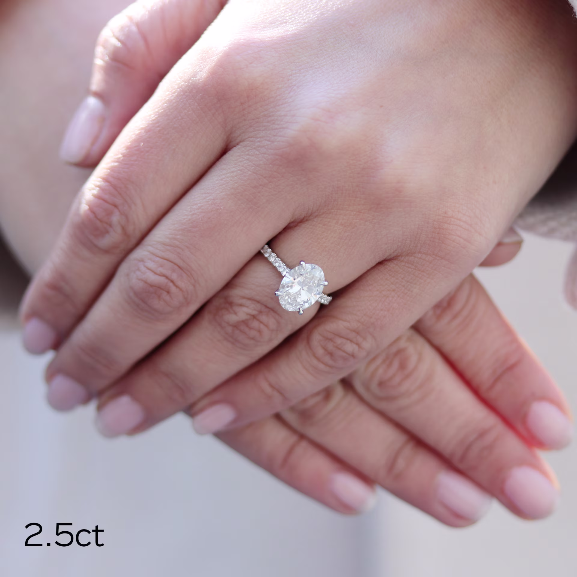 Diamonds set in Platinum Oval Cathedral Pavé Setting