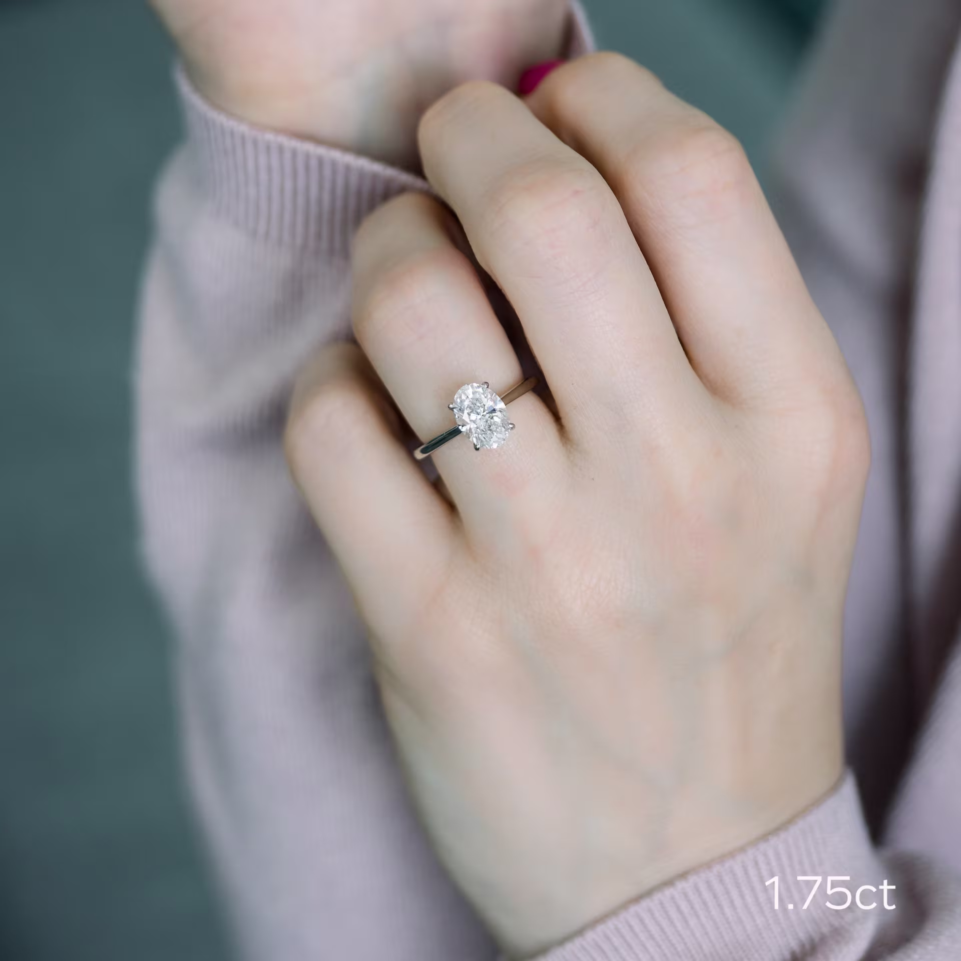 platinum 1.75 carat oval man made diamond in trellis solitaire setting on model ada diamonds design 328