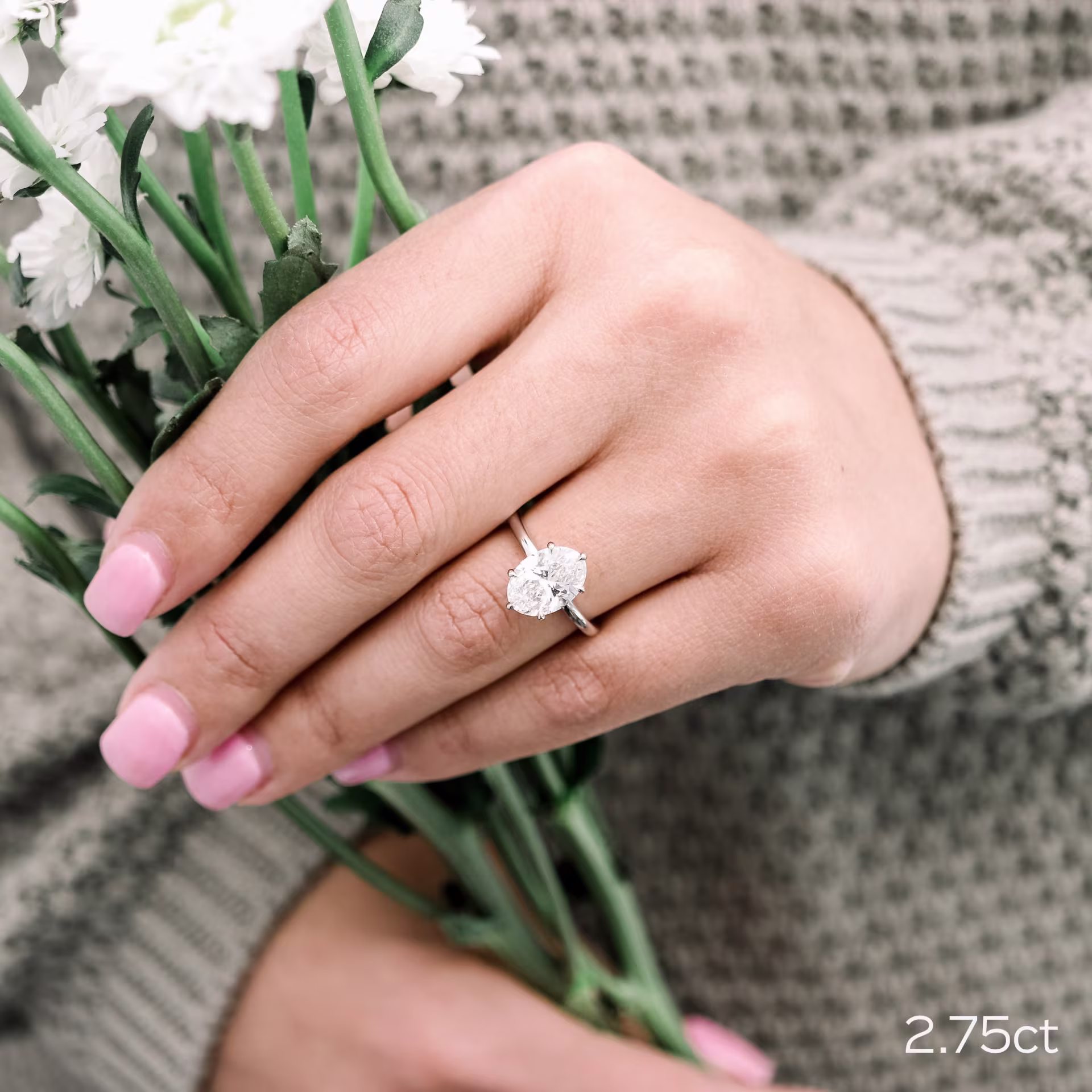 2.75ct oval lab diamond in six prong solitaire platinum