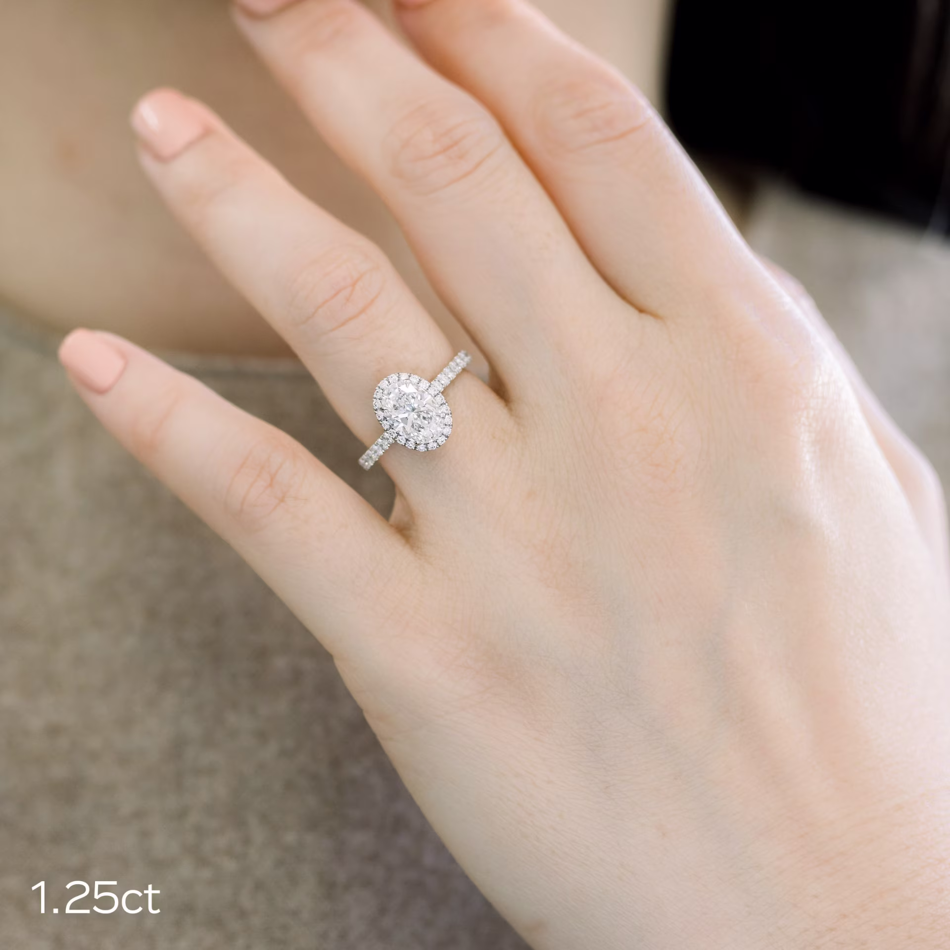 1.25ct oval lab diamond in halo setting