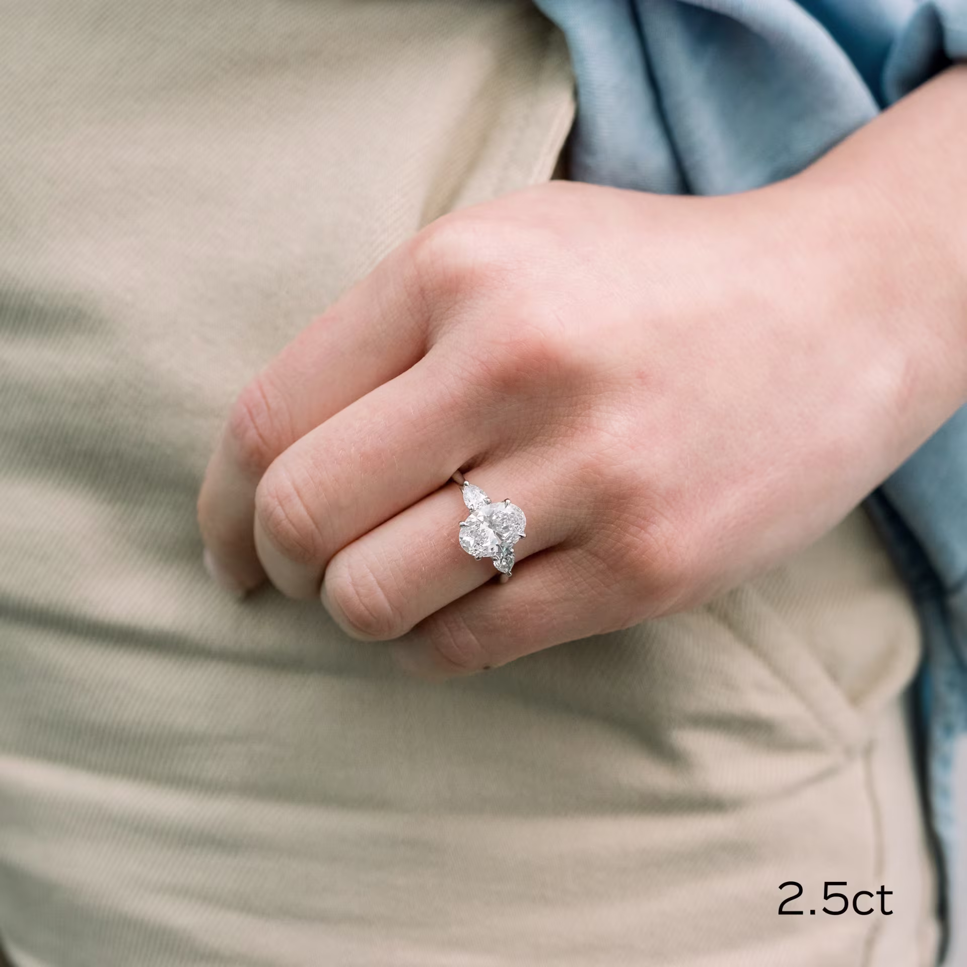 platinum 2.5ct oval and pear lab diamond three stone engagement ring ada diamonds design ad 460 on model