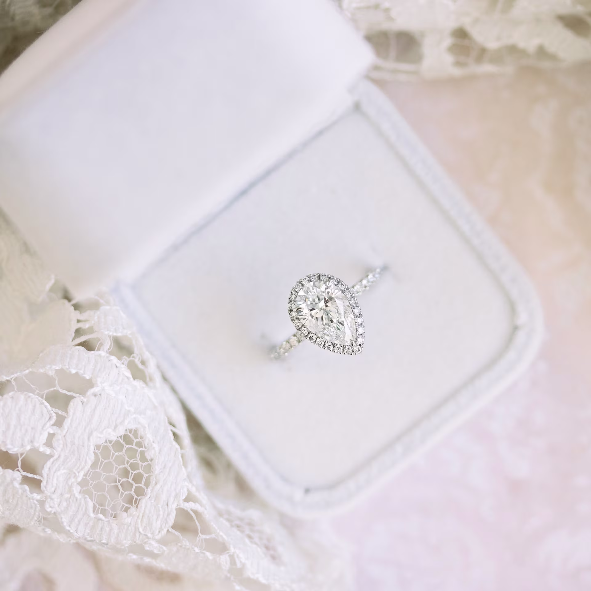 2ct lab grown pear diamond in halo setting