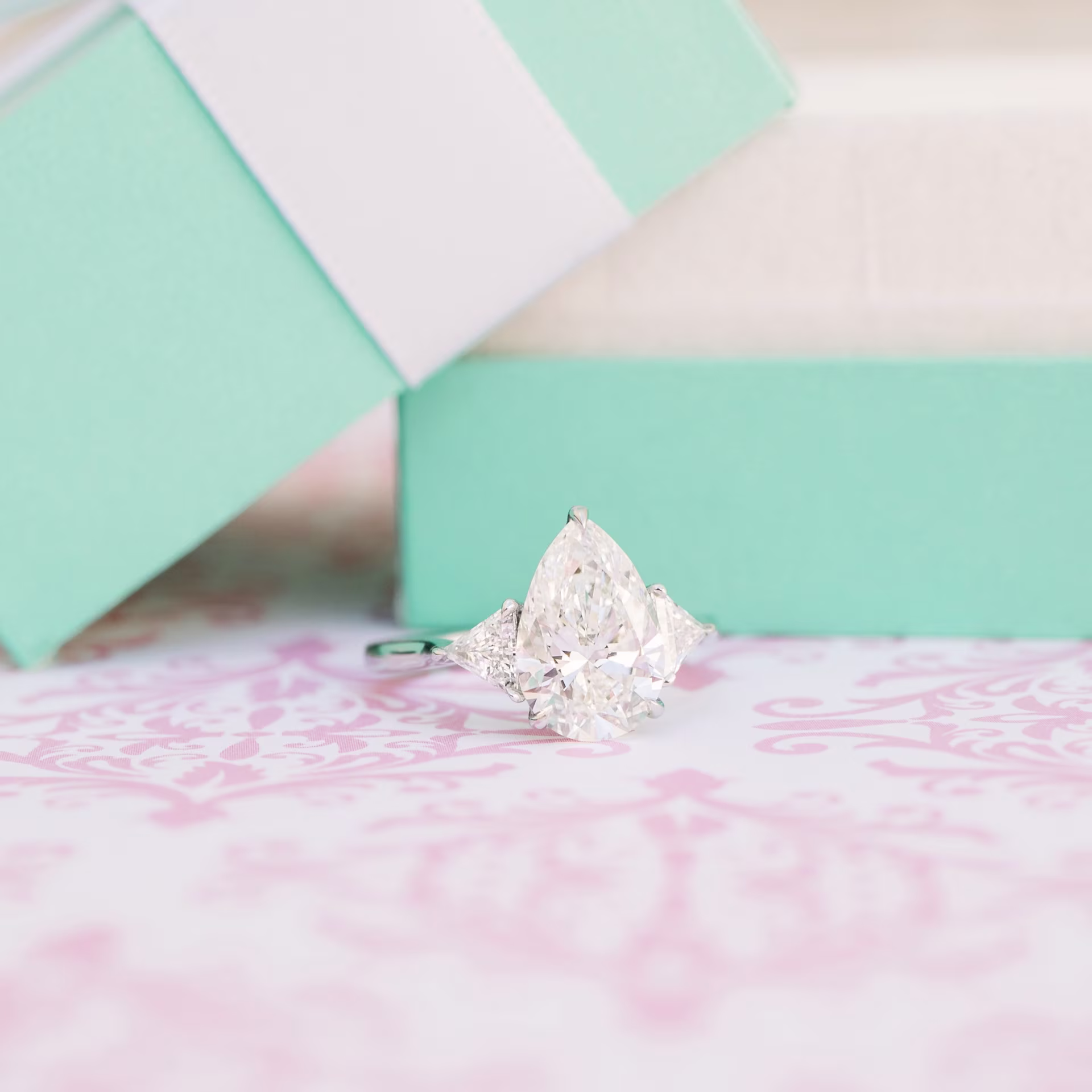 platinum 3.5 ct pear and trillon three stone lab diamond engagement ring ada diamonds design ad 496