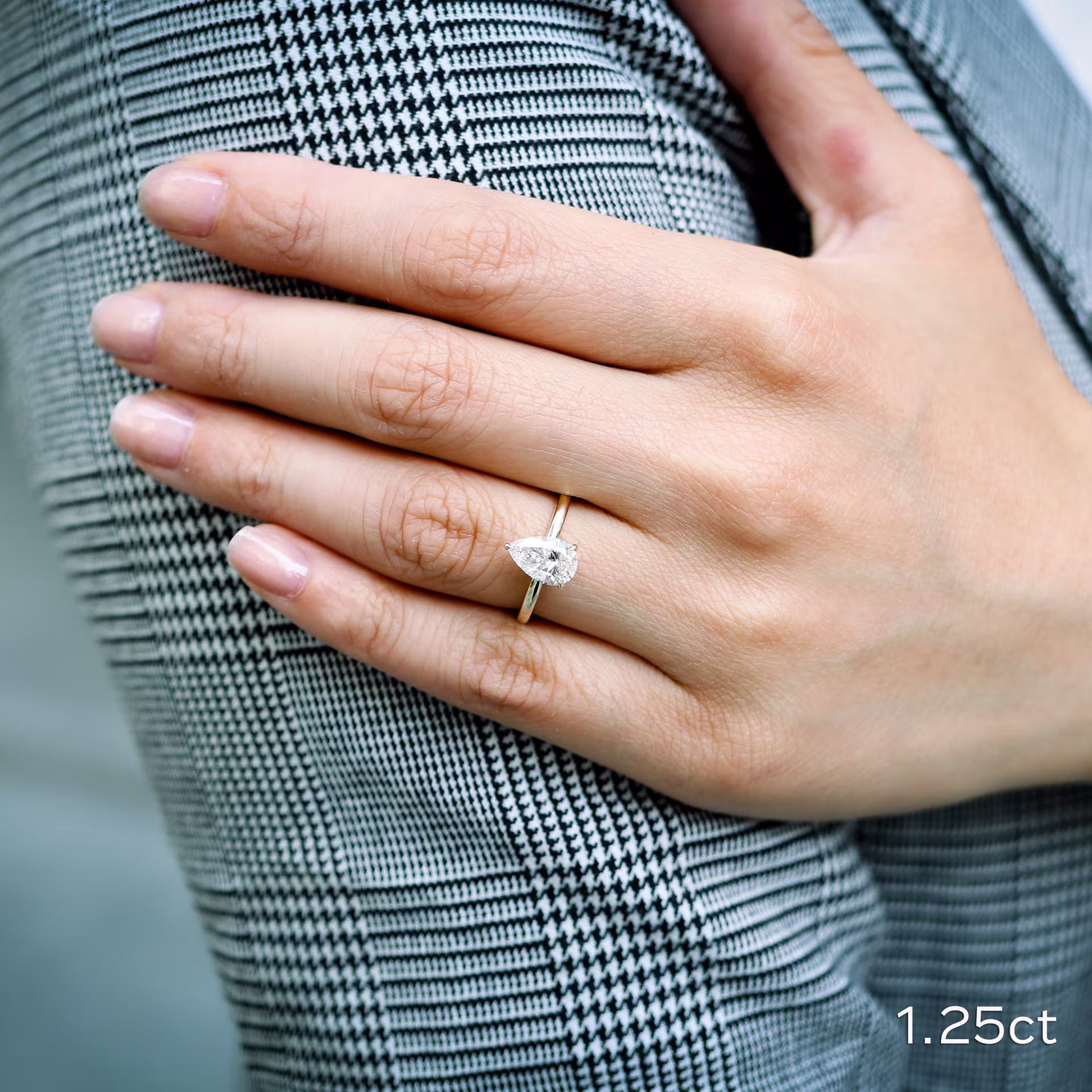 1.25 Carat Pear Solitaire Engagement Ring Yellow Gold on Hand Ada Diamonds Design AD187