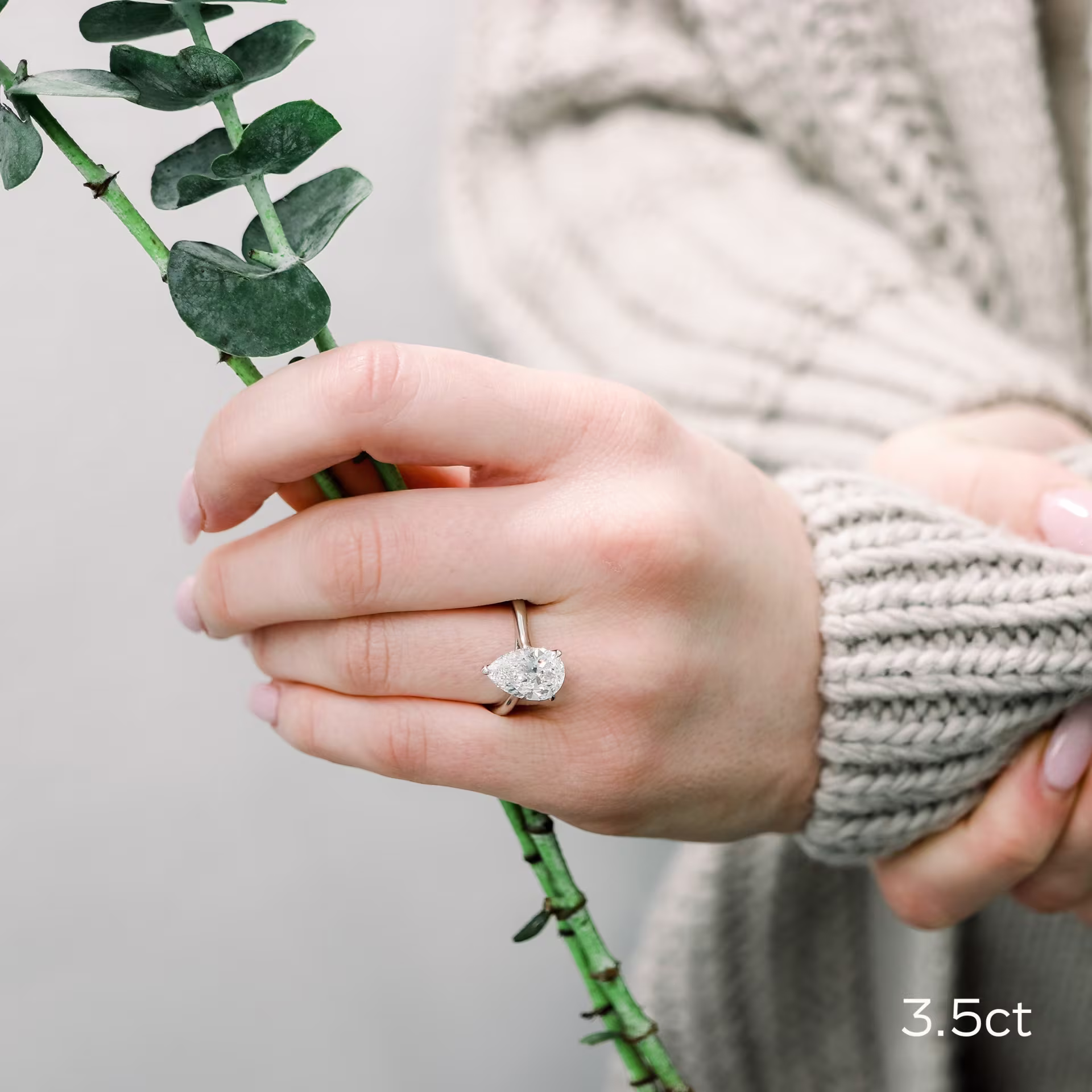 platinum 3.5 carat pear cut cathedral lab created diamond solitaire engagement ring with hidden halo ada diamonds design ad 339 on model