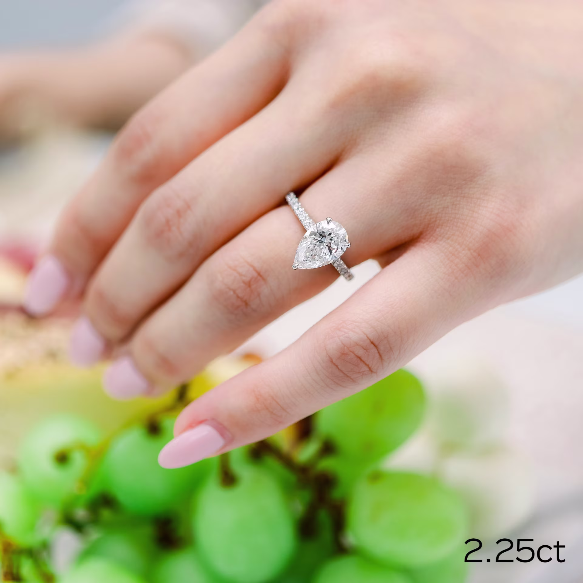 2.25ct lab pear diamond in pave setting