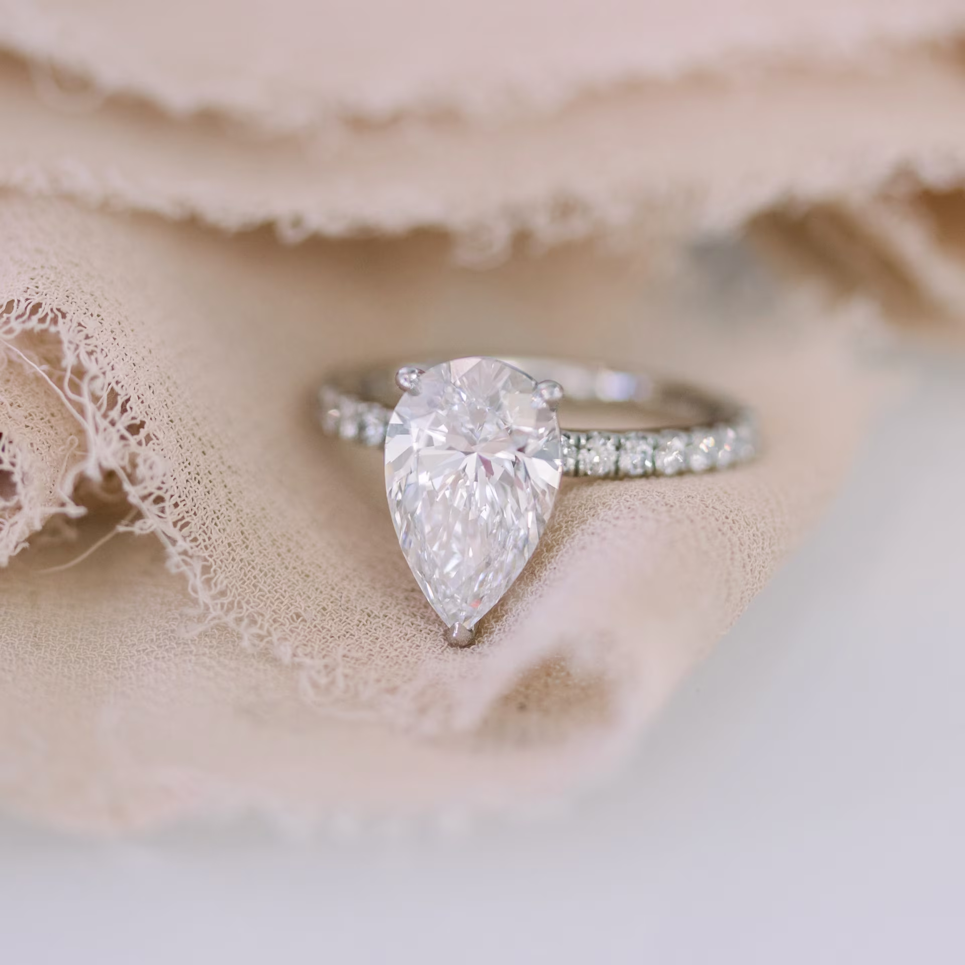 White Gold Pear Petite Pavé Setting featuring Hand Selected 2.75 Carat Diamonds (Main View)