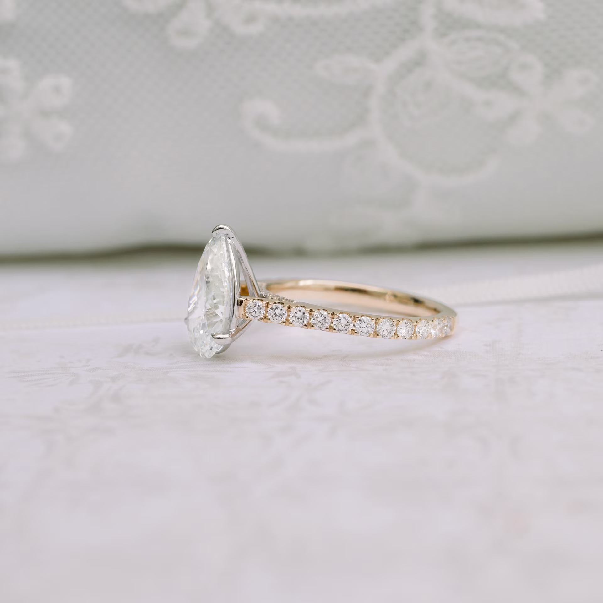 Two Tone Rose and White Gold 3 Carat Pear Cut Lab Diamond Engagement Ring in Cathedral Pavé Setting Ada Diamonds Design AD-355 Side View