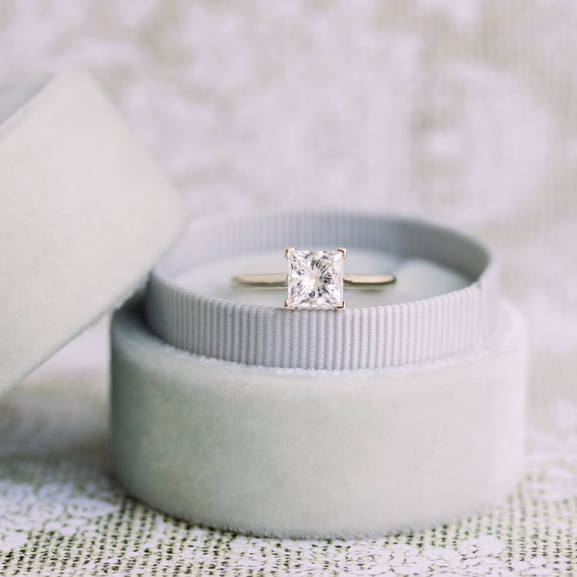 1.5ct princess cut in yellow gold cathedral solitaire