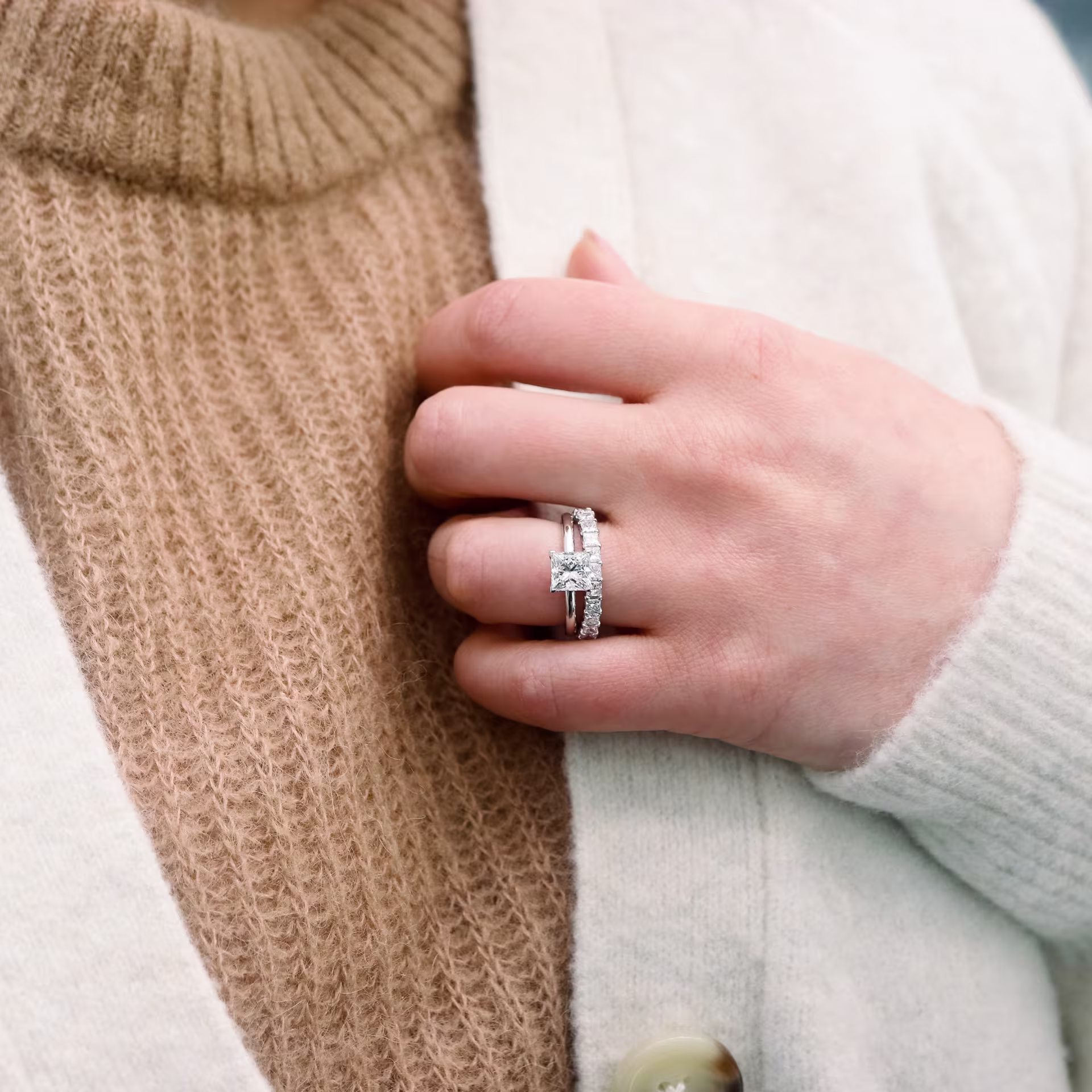 platinum princess cut lab diamond solitaire engagement ring and princess cut lab diamond wedding band on model ada diamonds design ad 341 and ad 194