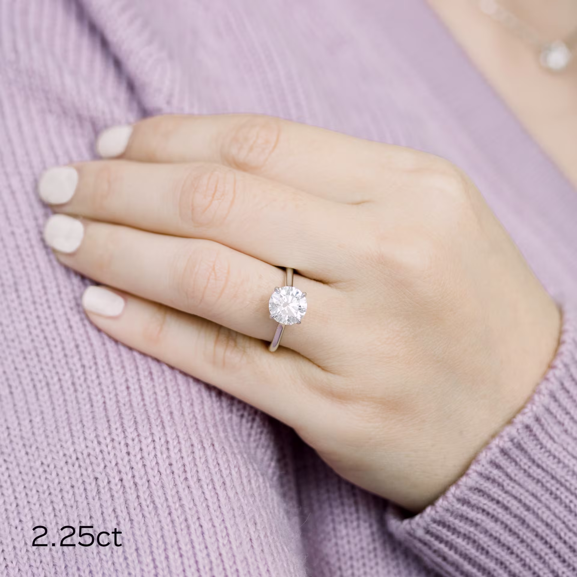 2.25ct round lab diamond in trellis solitaire