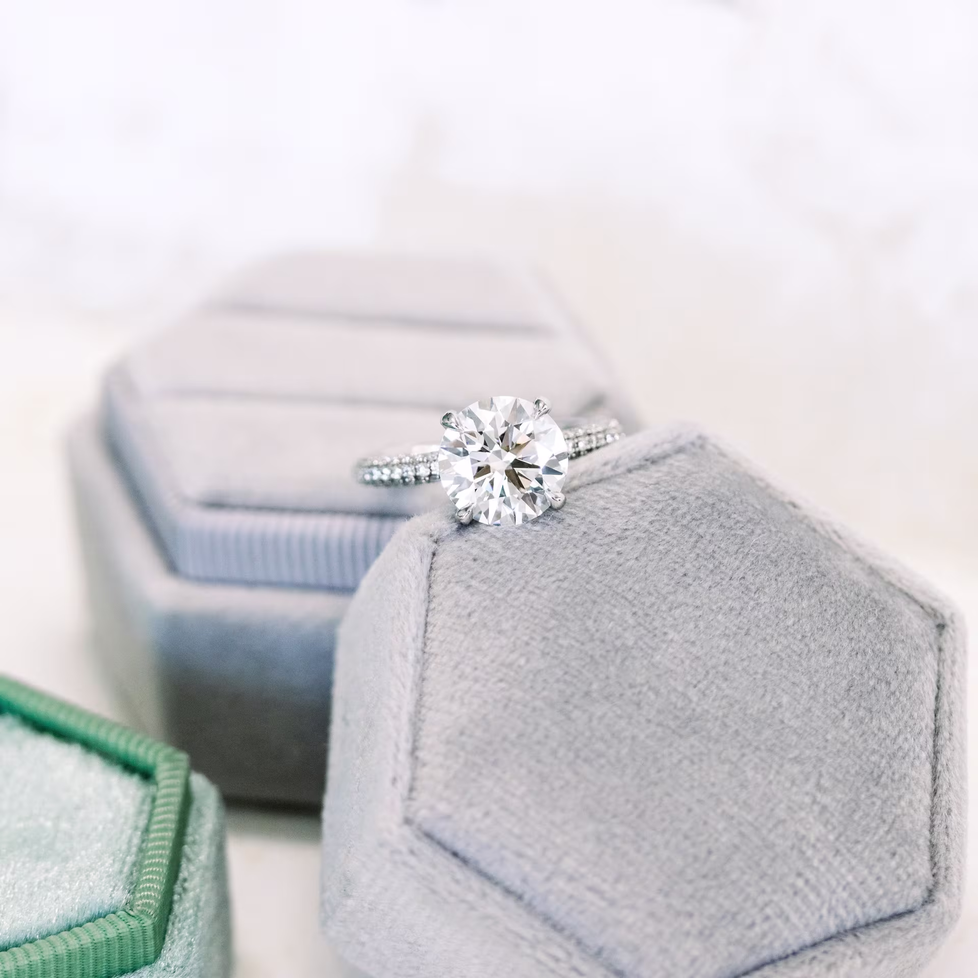 platinum 3 carat round lab diamond in three sided pavé setting with diamond prongs ada diamonds design ad 172