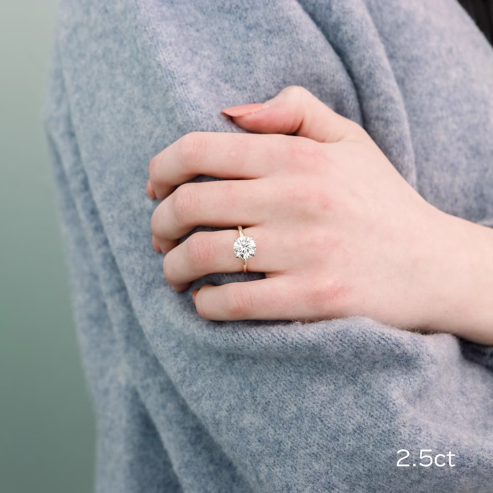 2.5 Carat Round Four Prong Solitaire Engagement Ring in Yellow Gold Made with Lab Diamonds Ada Diamonds Design Number AD-066 on Hand